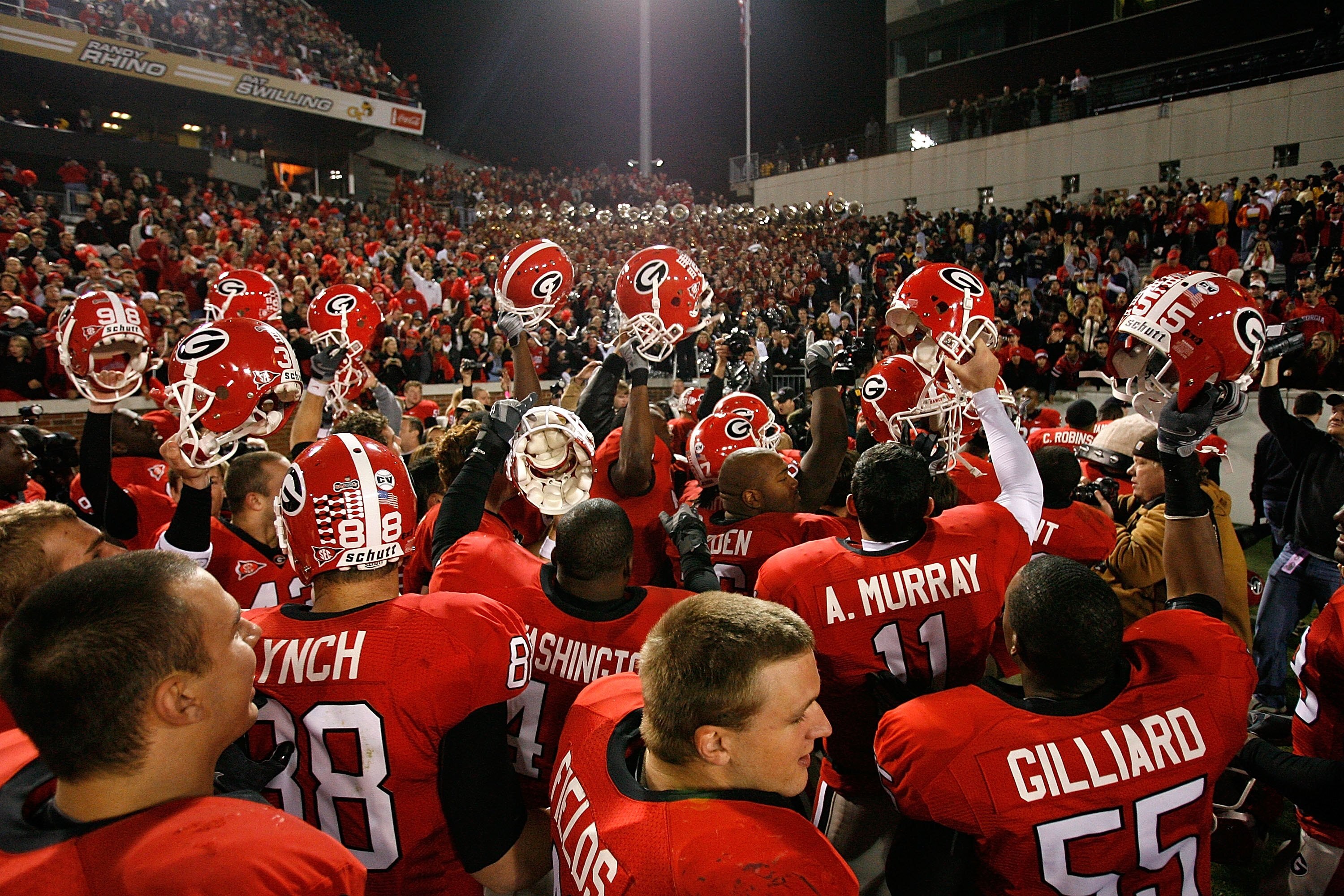 ATLANTA - NOVEMBER 28:  The Georgia Bulldogs celebrate their 30-24 win over the Georgia Tech Yellow Jackets at Bobby Dodd Stadium on November 28, 2009 in Atlanta, Georgia.  (Photo by Kevin C. Cox/Getty Images)