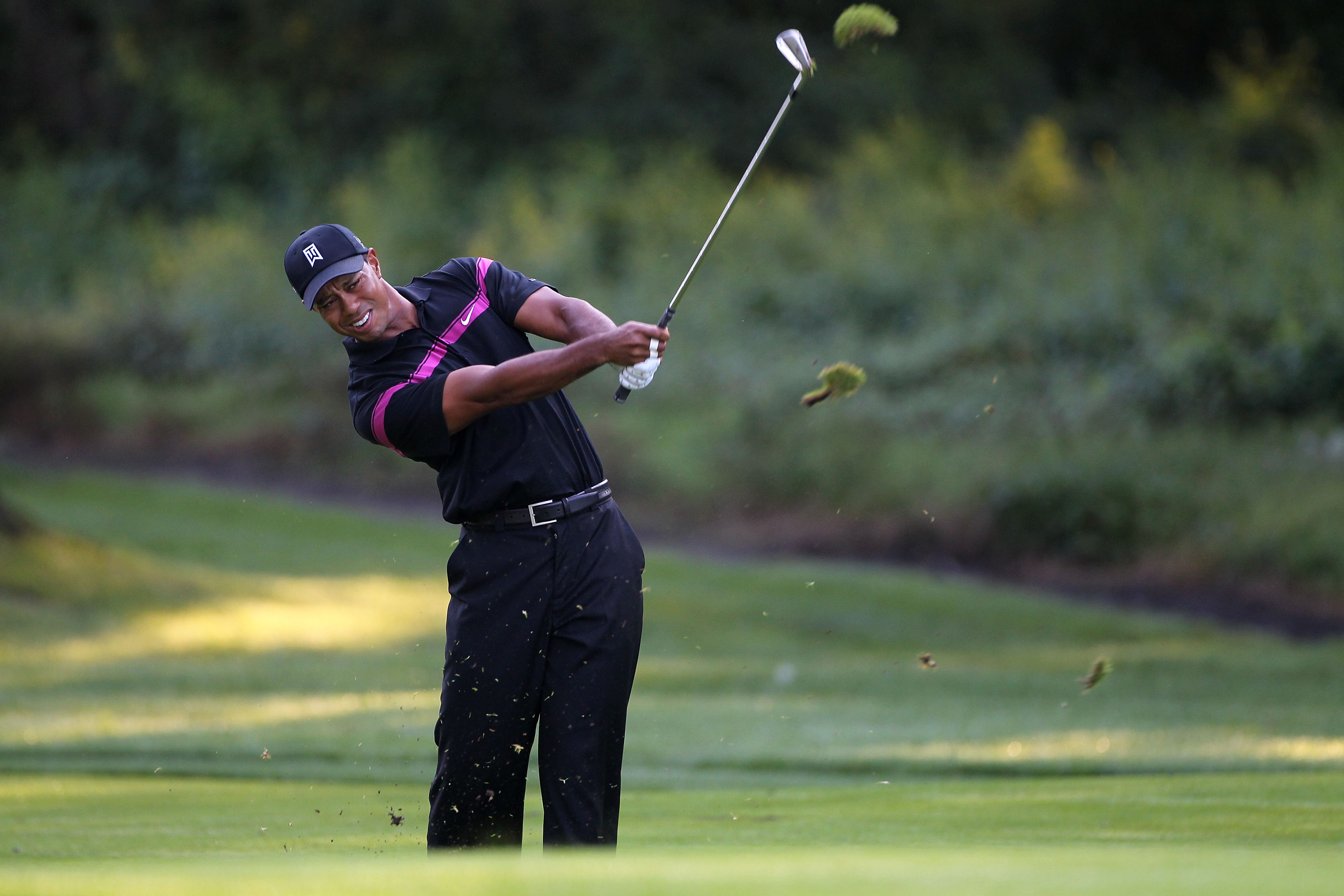 PARAMUS, NJ - AUGUST 26:  Tiger Woods watches his third shot on the third hole during the first round of The Barclays at the Ridgewood Country Club on August 26, 2010 in Paramus, New Jersey.  (Photo by Hunter Martin/Getty Images)
