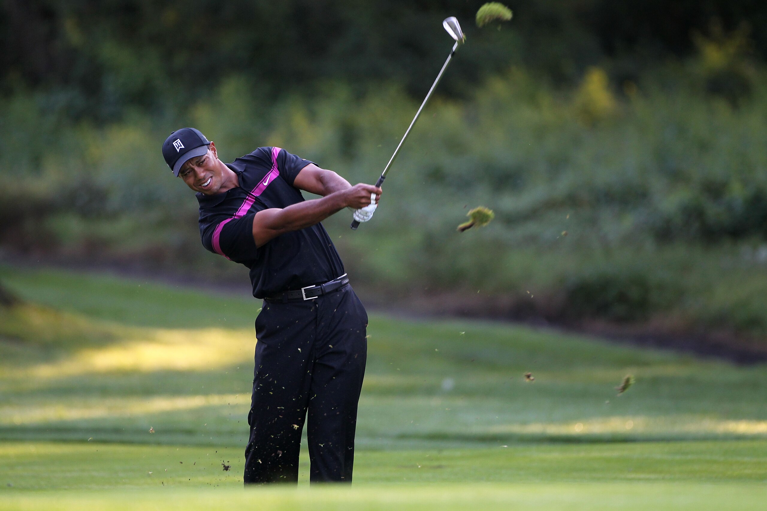 PARAMUS, NJ - AUGUST 26:  Tiger Woods watches his third shot on the third hole during the first round of The Barclays at the Ridgewood Country Club on August 26, 2010 in Paramus, New Jersey.  (Photo by Hunter Martin/Getty Images)