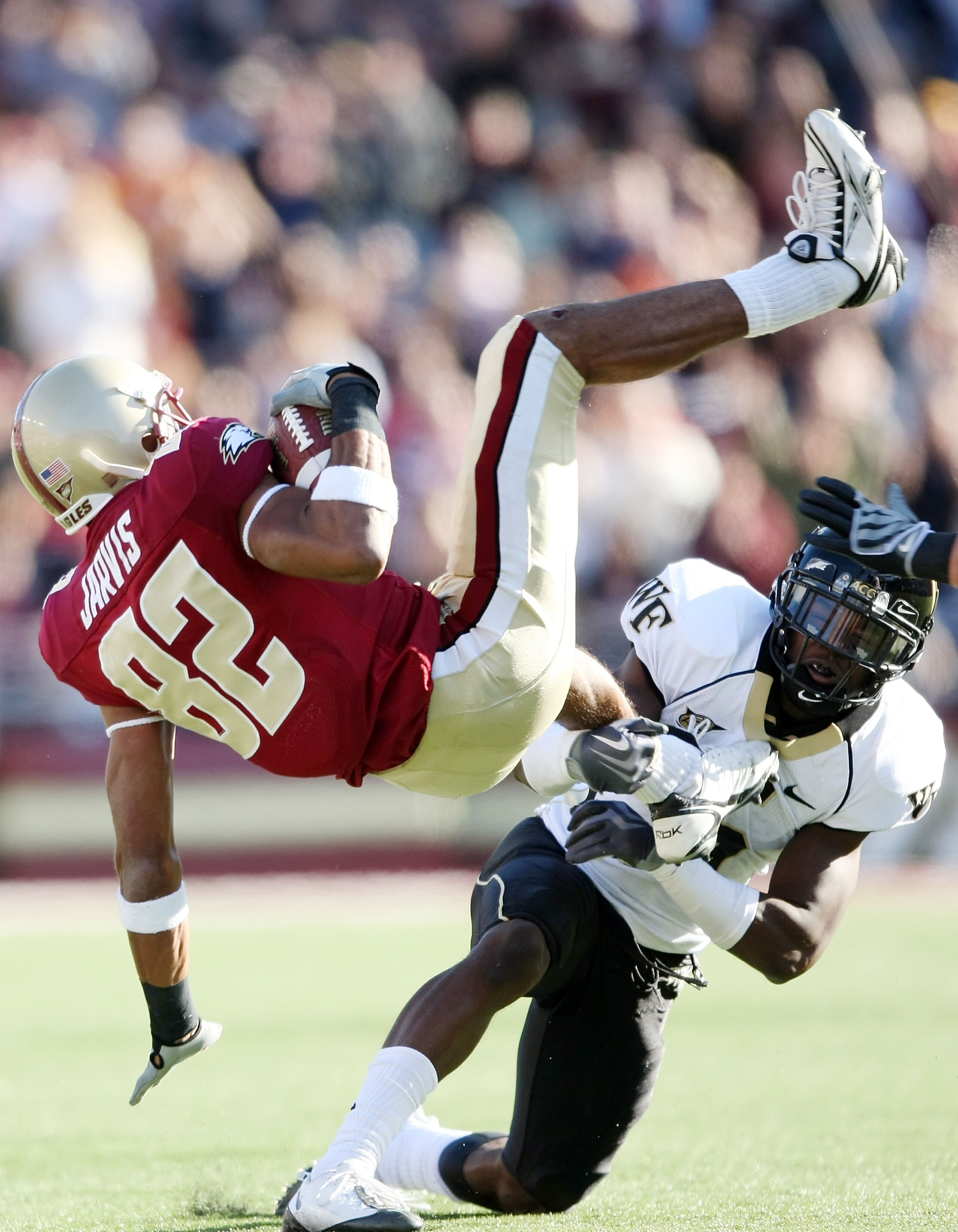 CHESTNUT HILL, MA - SEPTEMBER 26:  Cyhl Quarles #5 of the Wake Forest Demon Deacons  tackles Justin Jarvis #82 of the Boston College Eagles on September 26, 2009 at Alumni Stadium in Chestnut Hill, Massachusetts. Boston College defeated Wake Forest 27-24 