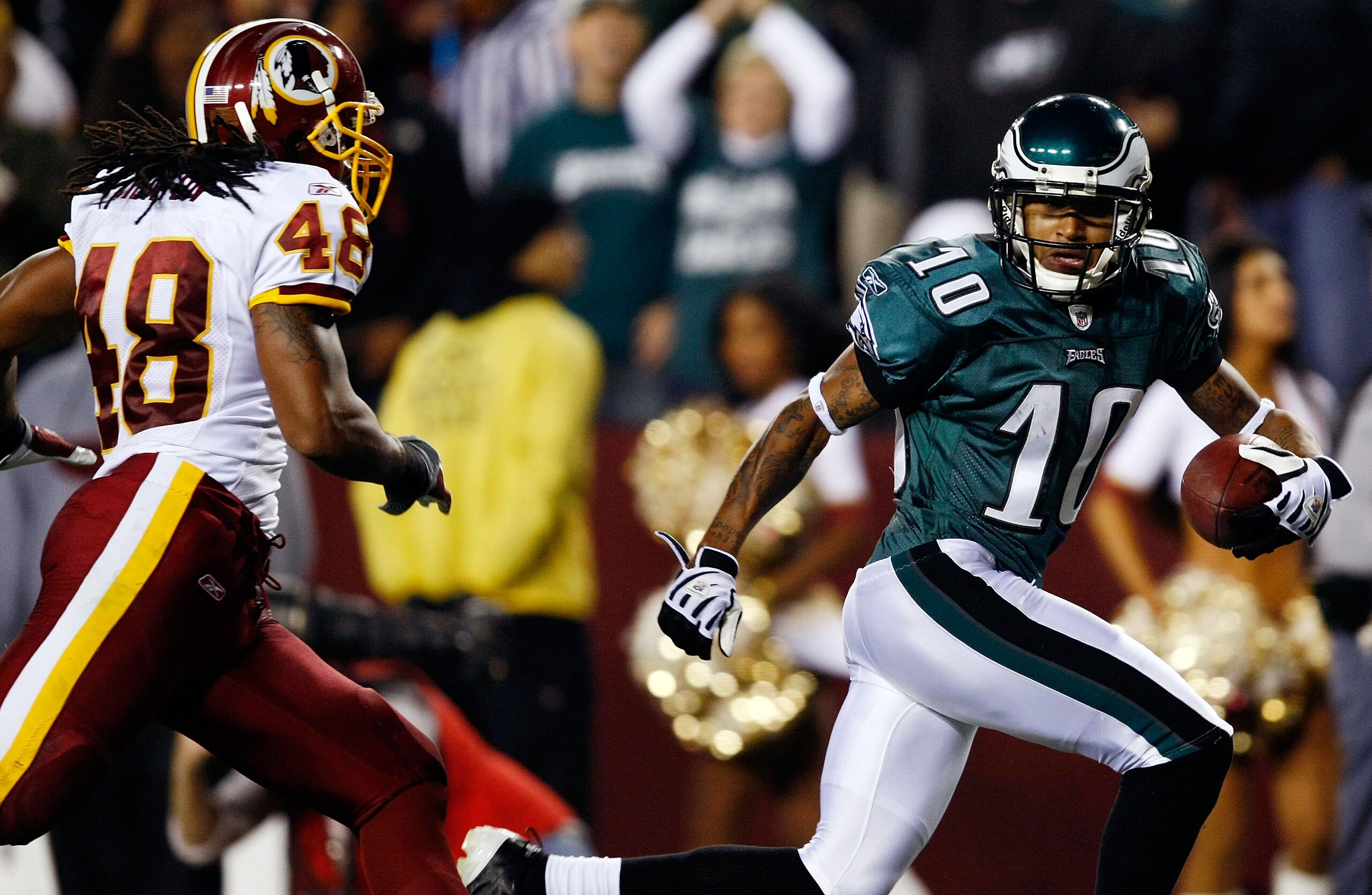 LANDOVER, MD - OCTOBER 26:  DeSean Jackson #10 of the Philadelphia Eagles races past Chris Horton #48 of the Washington Redskins to score his second touchdown at FedEx Field October 26, 2009 in Landover, Maryland.  The Eagles won the game 27-17.  (Photo b