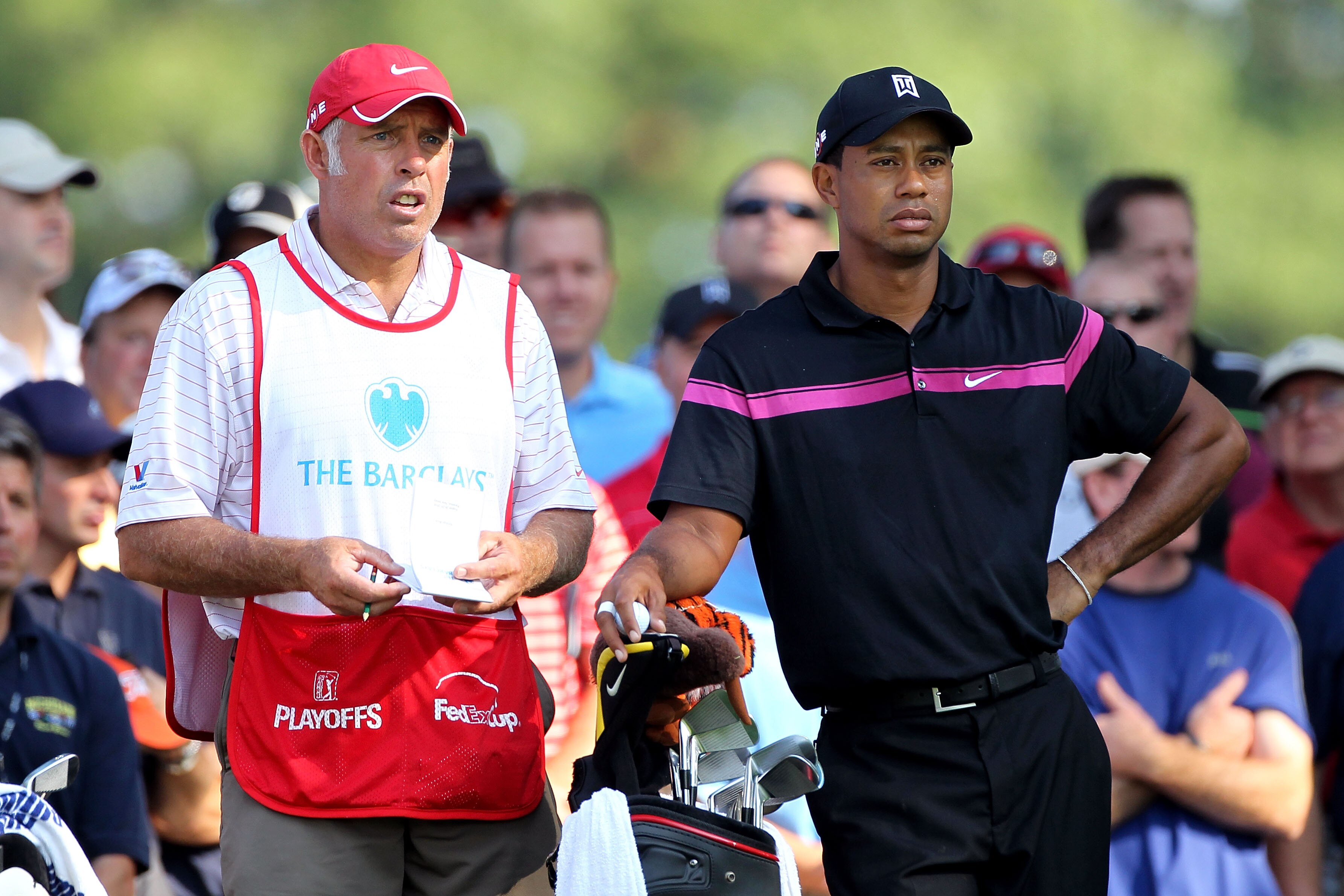 PARAMUS, NJ - AUGUST 26:  Tiger Woods (R) and his caddie Steve Williams look on from the tenth hole tee box during the first round of The Barclays at the Ridgewood Country Club on August 26, 2010 in Paramus, New Jersey.  (Photo by Hunter Martin/Getty Imag