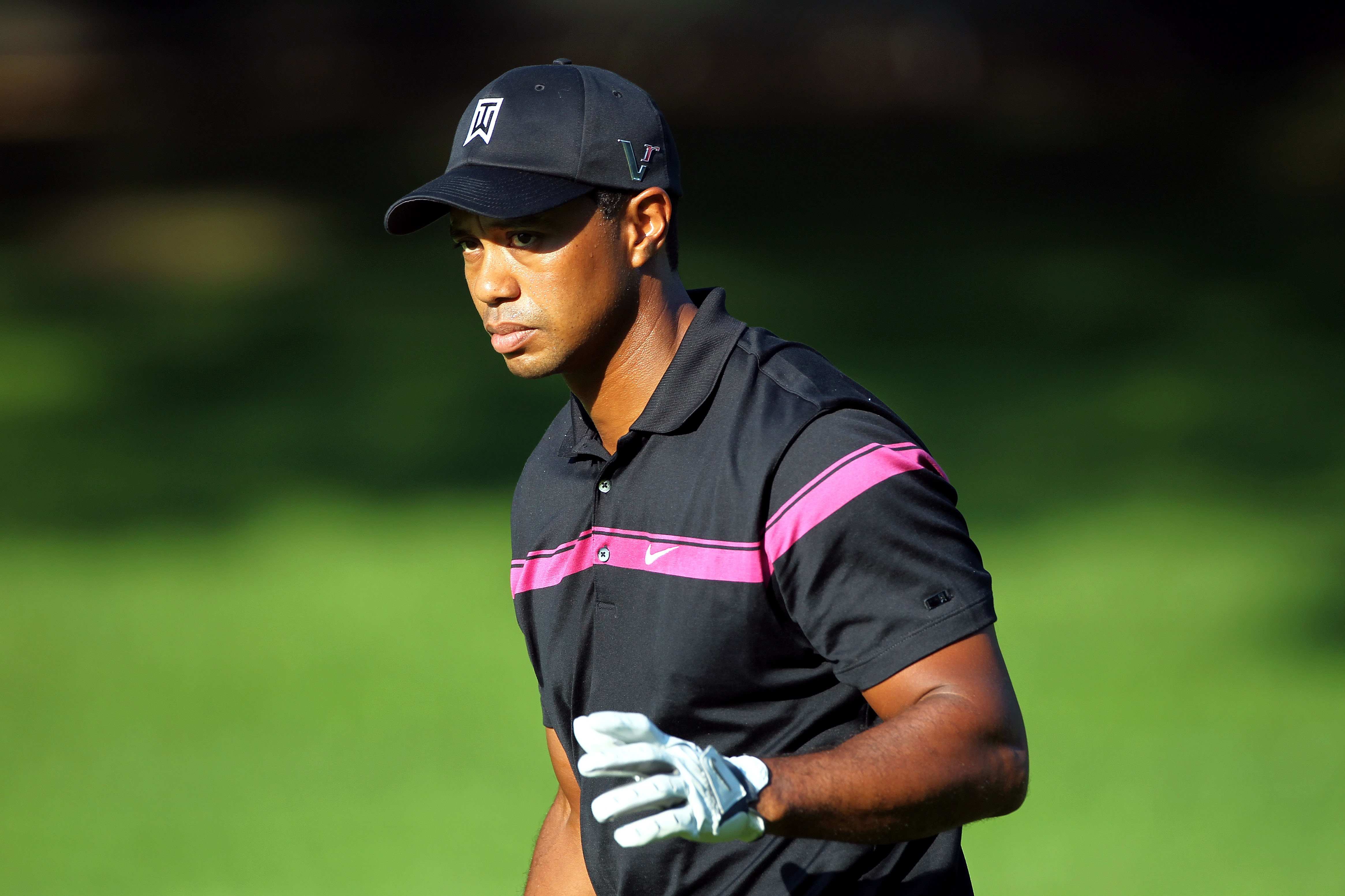 PARAMUS, NJ - AUGUST 26:  Tiger Woods reacts after he made a birdie on the seventh hole during the first round of The Barclays at the Ridgewood Country Club on August 26, 2010 in Paramus, New Jersey.  (Photo by Hunter Martin/Getty Images)