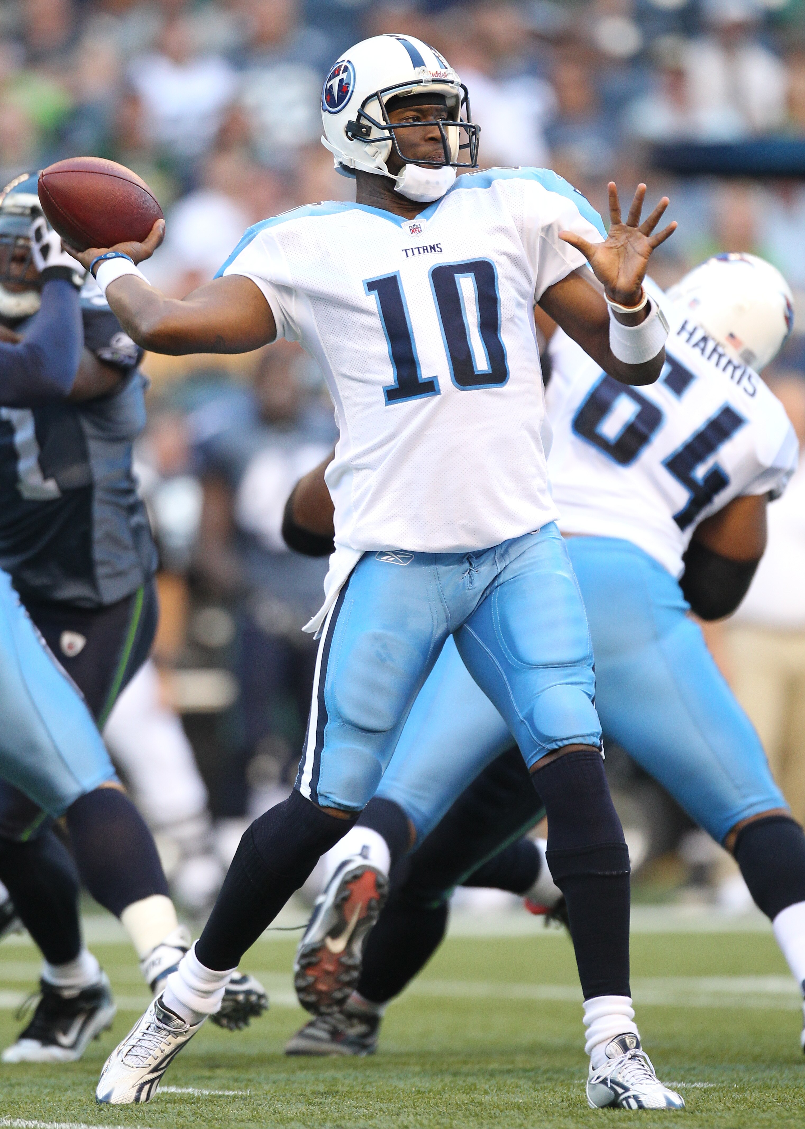 SEATTLE - AUGUST 14:  Quarterback Vince Young #10 of the Tennessee Titans passes during the preseason game against the Seattle Seahawks at Qwest Field on August 14, 2010 in Seattle, Washington. (Photo by Otto Greule Jr/Getty Images)