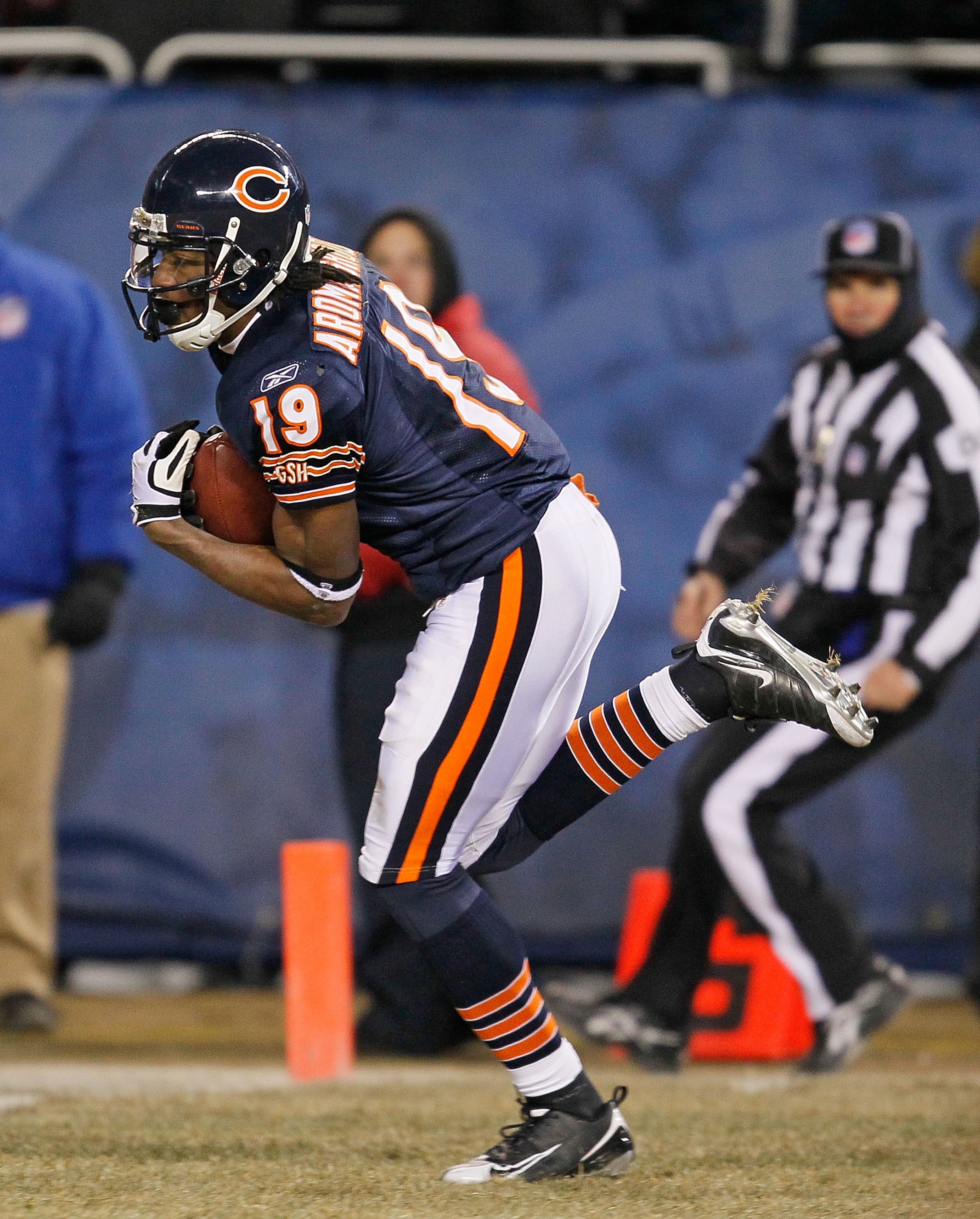 CHICAGO - DECEMBER 28: Devin Aromashodu #19 of the Chicago Bears catches the game-winning touchdown pass against the Minnesota Vikings at Soldier Field on December 28, 2009 in Chicago, Illinois. The Bears defeated the Vikings 36-30 in overtime.  (Photo by