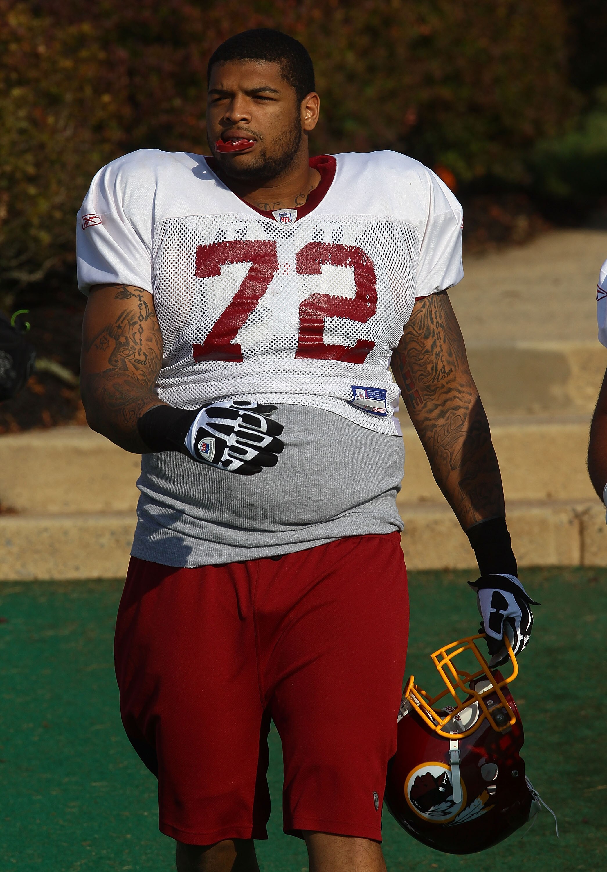 ASHBURN, VA - JULY 30:  Rookie offensive tackle Trent Williams #72 of the Washington Redskins arrives for practice on the second day of training camp July 30, 2010 in Ashburn, Virginia. Williams signed his contract with the team early this morning.  (Phot