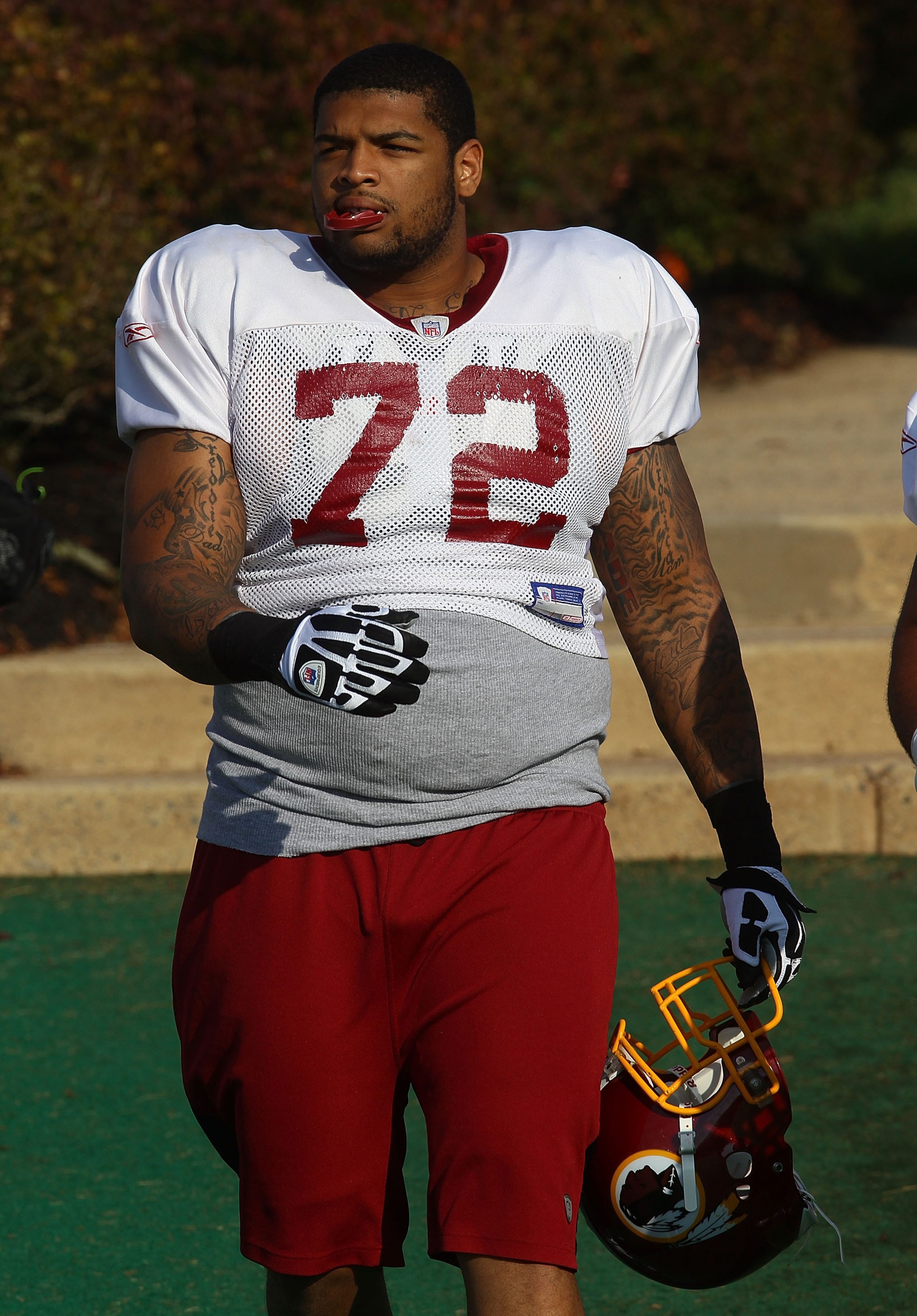 ASHBURN, VA - JULY 30:  Rookie offensive tackle Trent Williams #72 of the Washington Redskins arrives for practice on the second day of training camp July 30, 2010 in Ashburn, Virginia. Williams signed his contract with the team early this morning.  (Phot