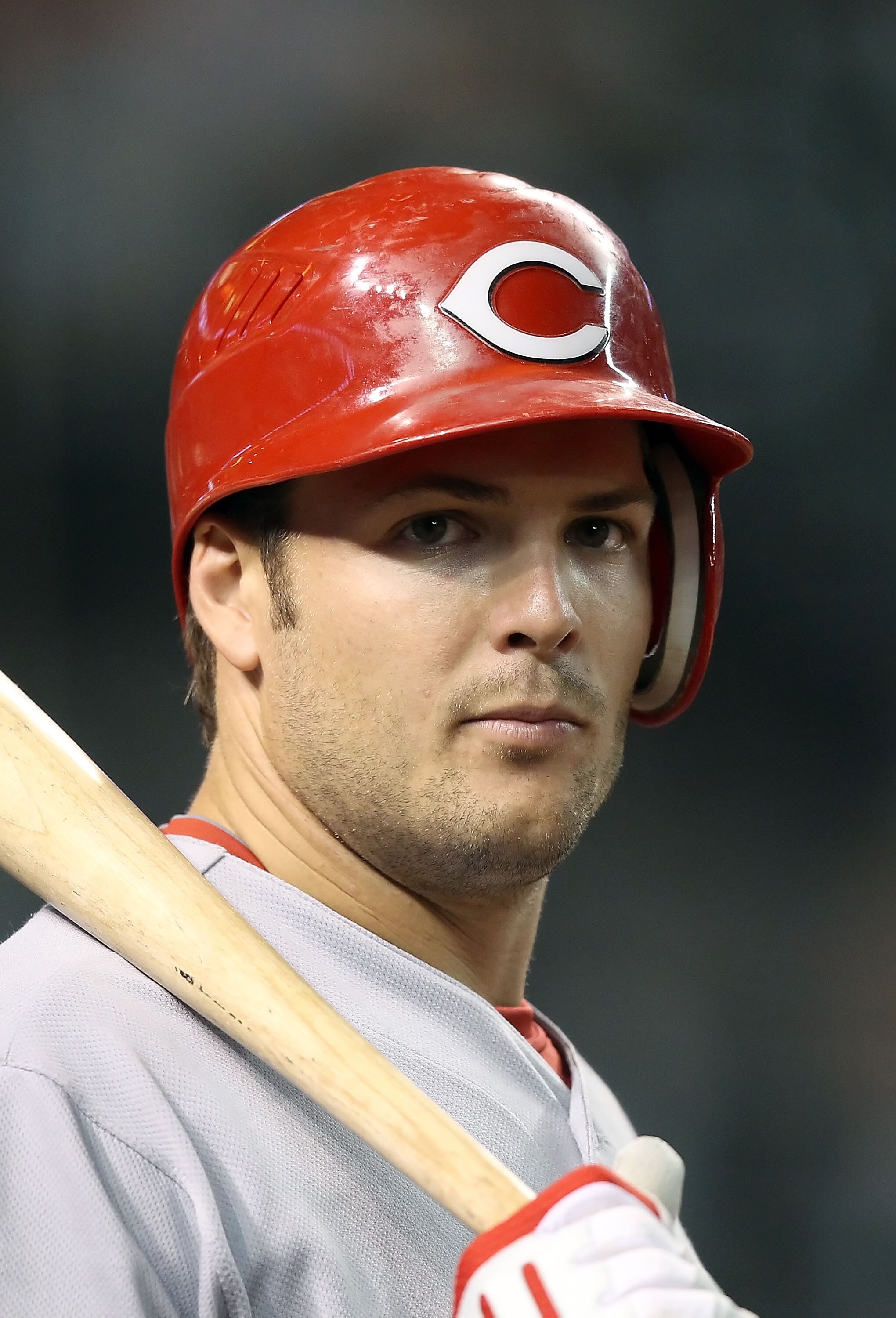 PHOENIX - AUGUST 18:  Chris Heisey #28 of the Cincinnati Reds on deck during the Major League Baseball game against the Arizona Diamondbacks at Chase Field on August 18, 2010 in Phoenix, Arizona.  The Reds defeated the Diamondbacks 11-7.  (Photo by Christ