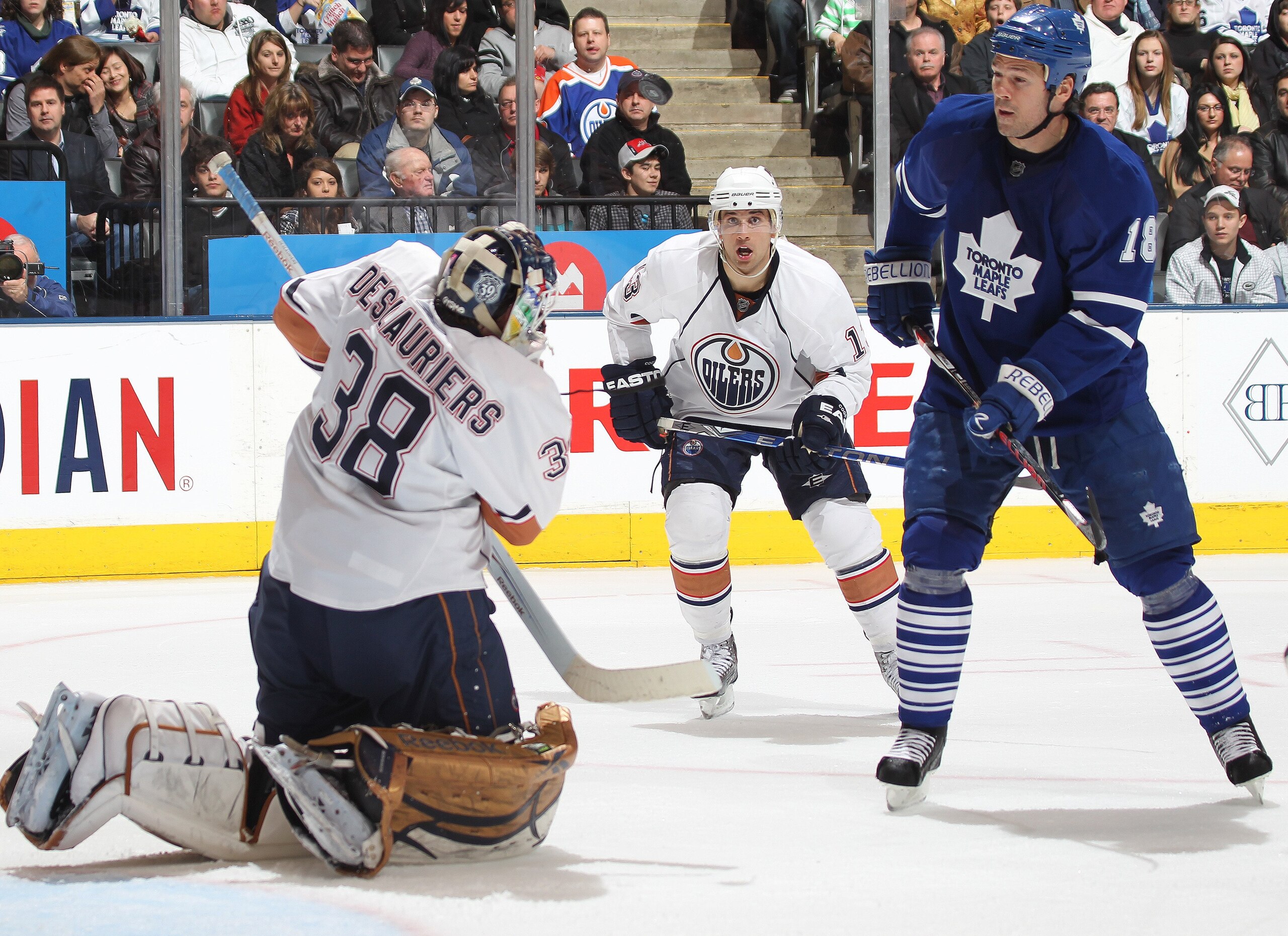TORONTO, ON - MARCH 13: Jeff Deslauriers #38 of the Edmonton Oilers gets his shoulder on a shot in a game against the Toronto Maple Leafs on March 13, 2010 at the Air Canada Centre in Toronto, Ontario. The Leafs defeated the Oilers 6-4. (Photo by Claus A TORONTO, ON - MARCH 13: Jeff Deslauriers #38 of the Edmonton Oilers gets his shoulder on a shot in a game against the Toronto Maple Leafs on March 13, 2010 at the Air Canada Centre in Toronto, Ontario. The Leafs defeated the Oilers 6-4. (Photo by Claus A