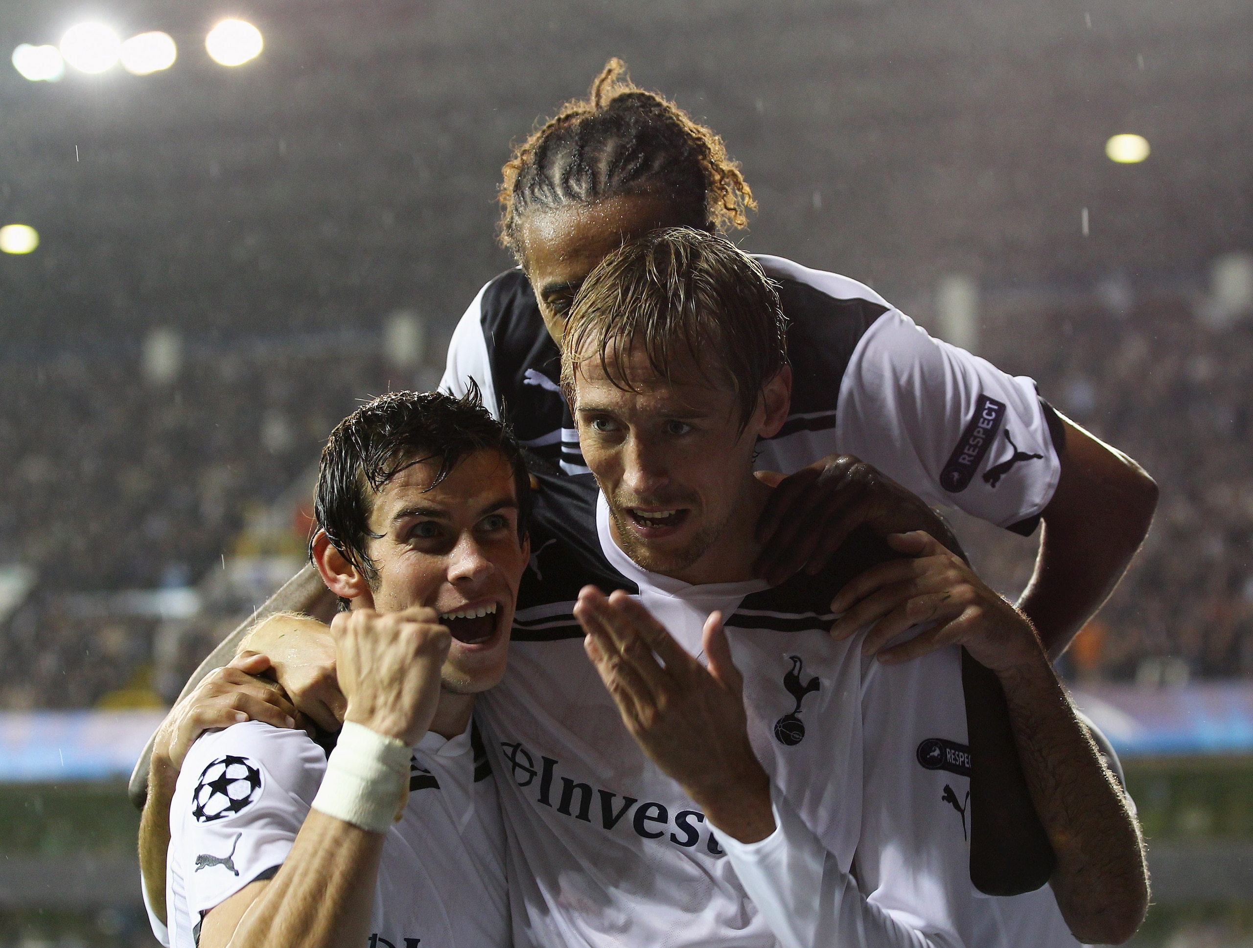 LONDON, ENGLAND - AUGUST 25: Peter Crouch of Tottenham Hotspur celebrates with team mates Benoit Assou-Ekotto and Gareth Bale as he scores their third goal during the UEFA Champions League play-off second leg match between Tottenham Hotspur and BSC Young LONDON, ENGLAND - AUGUST 25: Peter Crouch of Tottenham Hotspur celebrates with team mates Benoit Assou-Ekotto and Gareth Bale as he scores their third goal during the UEFA Champions League play-off second leg match between Tottenham Hotspur and BSC Young