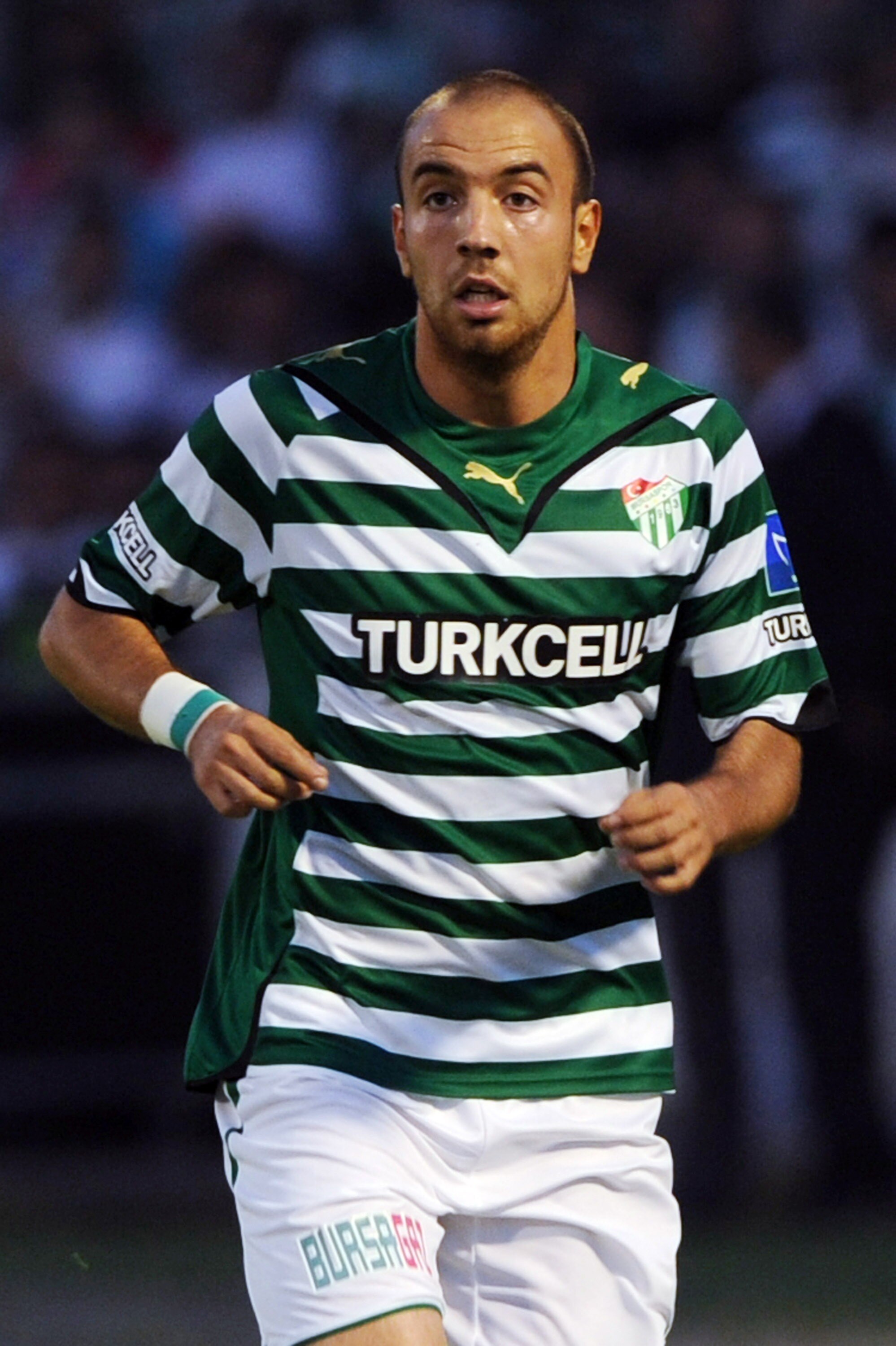BURSA, TURKEY - MAY 16:  Sercan Yildirim of Bursaspor in action during the Super League match between Bursaspor and Besiktas at Ataturk Stadium on May 16, 201o in Bursa, Turkey. (Photo by  EuroFootball/Getty Images)