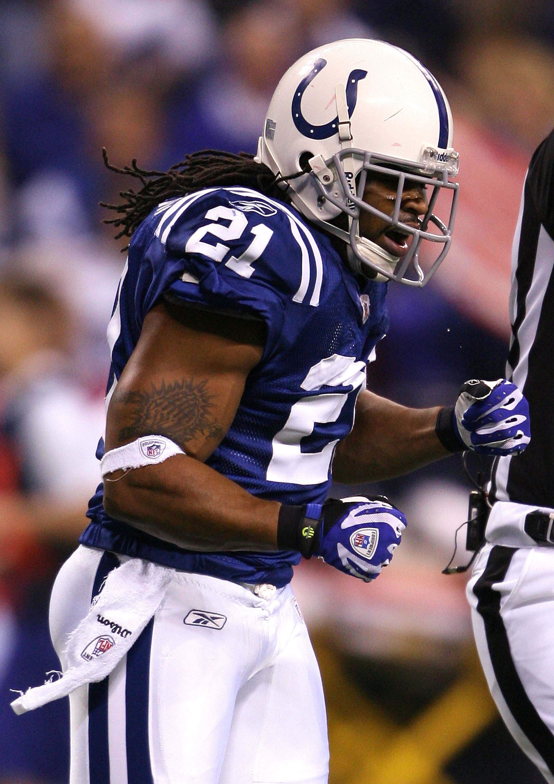 INDIANAPOLIS - NOVEMBER 02:  Bob Sanders #21 of the Indianapolis Colts reacts to a defensive play against the New England Patriots at Lucas Oil Stadium on November 2, 2008 in Indianapolis, Indiana.  (Photo by Andy Lyons/Getty Images)