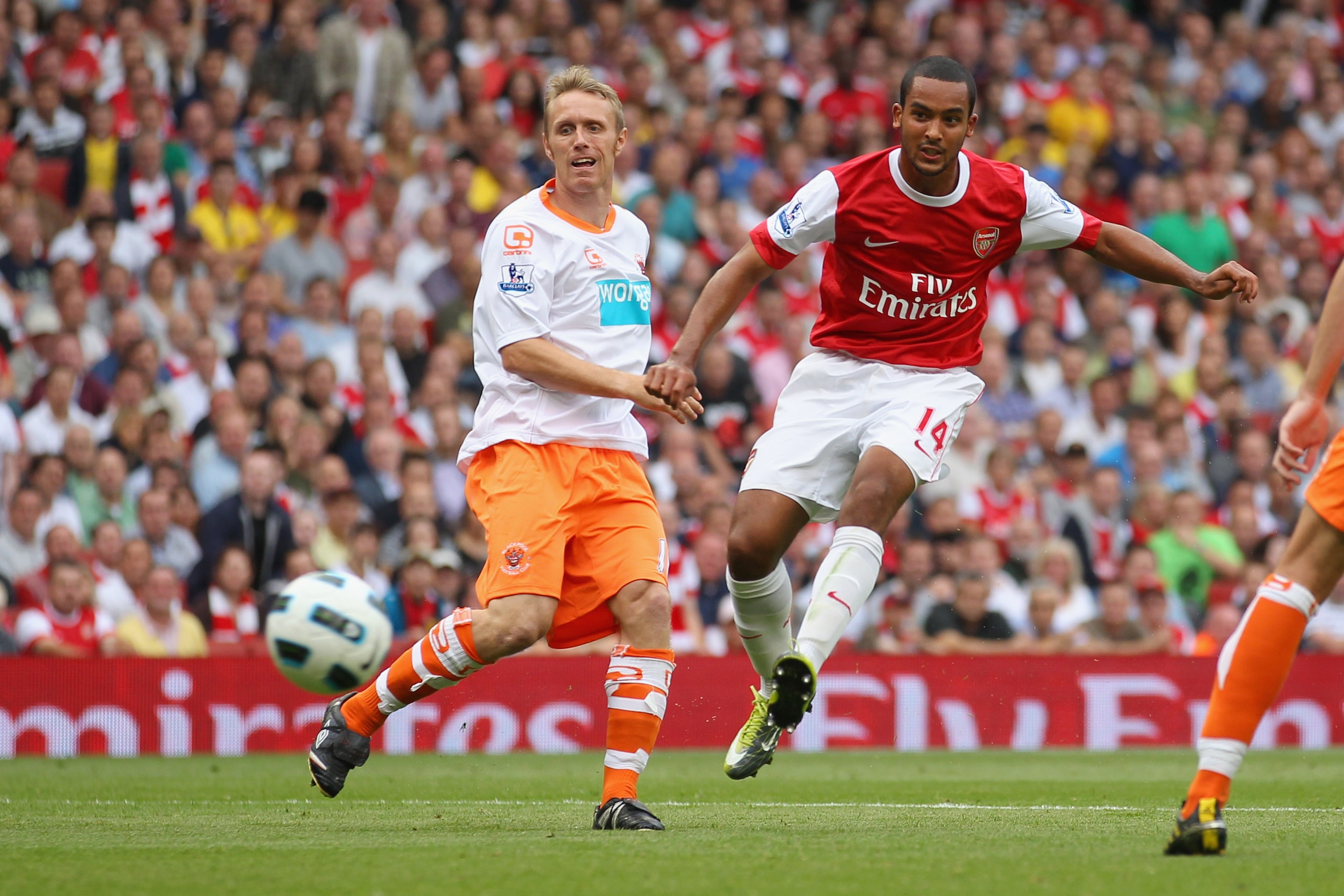LONDON, ENGLAND - AUGUST 21: Theo Walcott of Arsenal scores his third goal for a hat-trick during the Barclays Premier League match between Arsenal and Blackpool at The Emirates Stadium on August 21, 2010 in London, England. (Photo by Clive Rose/Getty I LONDON, ENGLAND - AUGUST 21: Theo Walcott of Arsenal scores his third goal for a hat-trick during the Barclays Premier League match between Arsenal and Blackpool at The Emirates Stadium on August 21, 2010 in London, England. (Photo by Clive Rose/Getty I