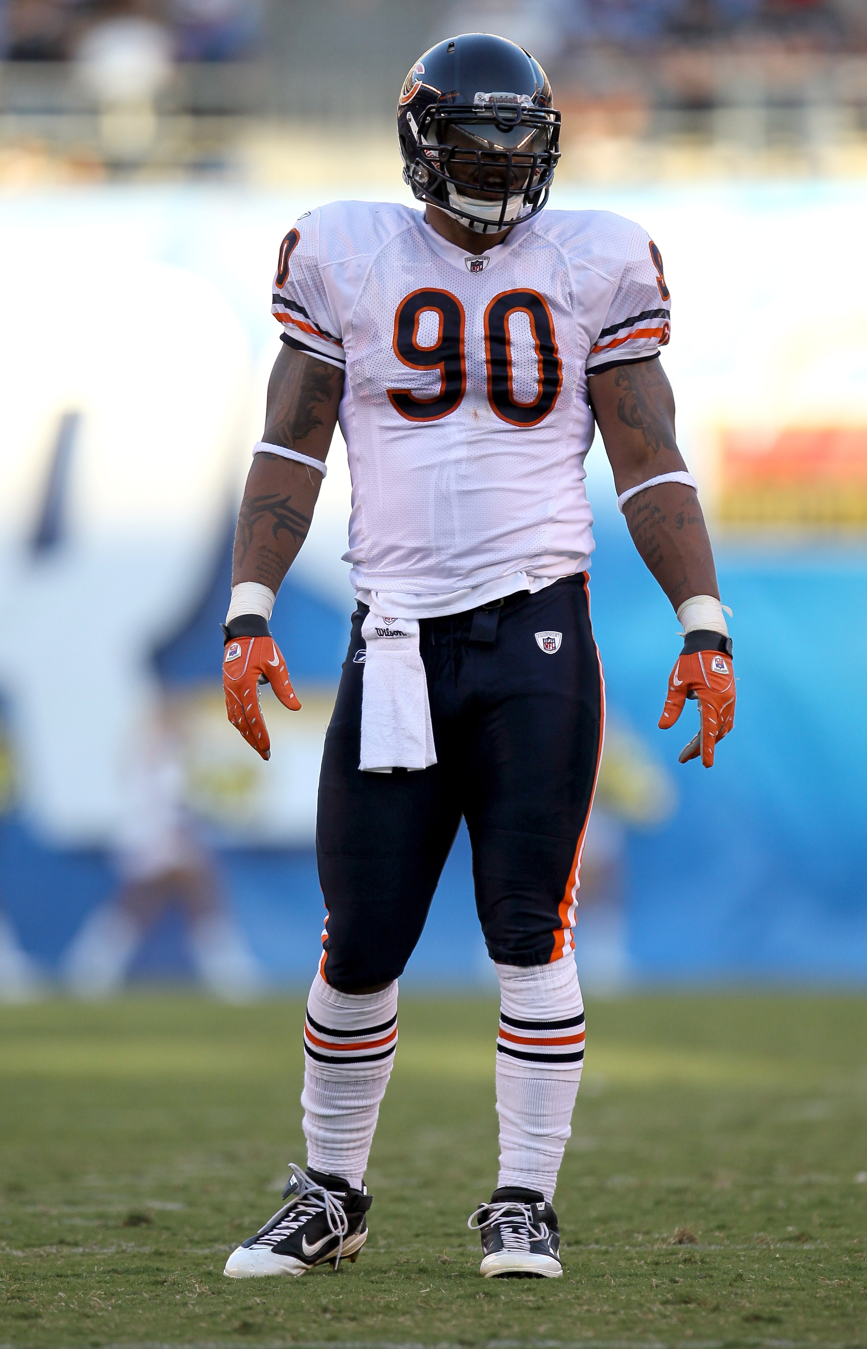 SAN DIEGO - AUGUST 14:  Defensive end Julius Peppers #90 of the Chicago Bears waits at the line of scrimmage in the game against the San Diego Chargers on August 14, 2010 at Qualcomm Stadium in San Diego, California.  (Photo by Stephen Dunn/Getty Images)