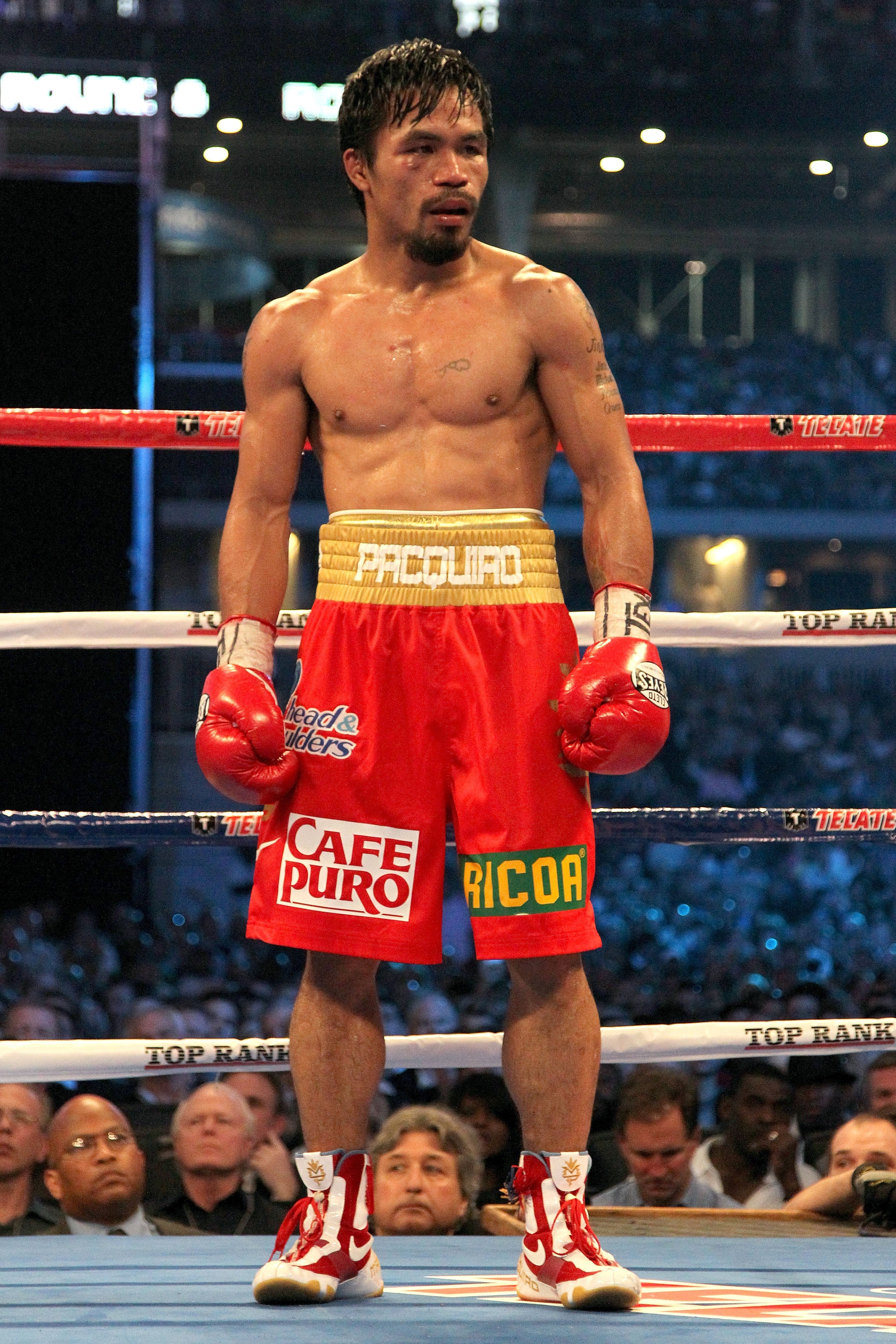 ARLINGTON, TX - MARCH 13:  Manny Pacquiao of the Philippines looks on in the ring against Joshua Clottey of Ghana during the WBO welterweight title fight at Cowboys Stadium on March 13, 2010 in Arlington, Texas. Pacquiao defeated Clottey by unanimous deci