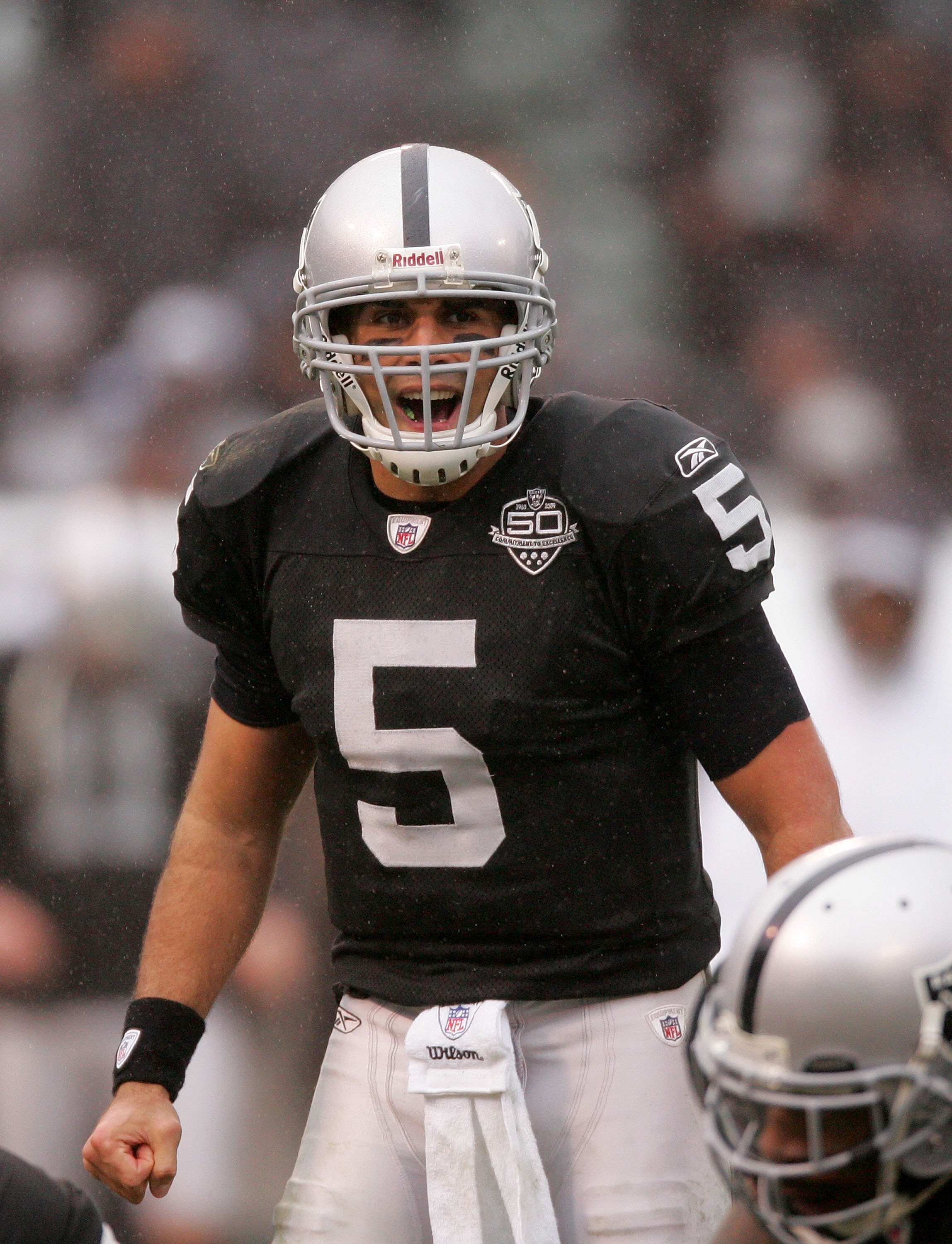 OAKLAND, CA - DECEMBER 13:  Bruce Gradkowski #5 of the Oakland Raiders shouts to his team during their game against the Washington Redskins at Oakland-Alameda County Coliseum on December 13, 2009 in Oakland, California.  (Photo by Ezra Shaw/Getty Images)