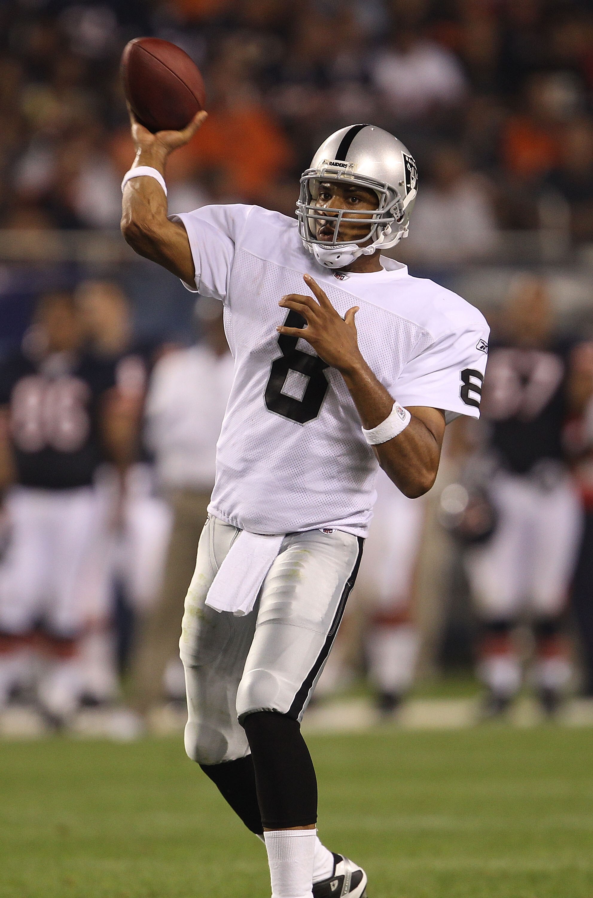 CHICAGO - AUGUST 21: Jason Campbell #8 of the Oakland Raiders throws a pass against the Chicago Bears during a preseason game at Soldier Field on August 21, 2010 in Chicago, Illinois. The Raiders defeated the Bears 32-17. (Photo by Jonathan Daniel/Getty I