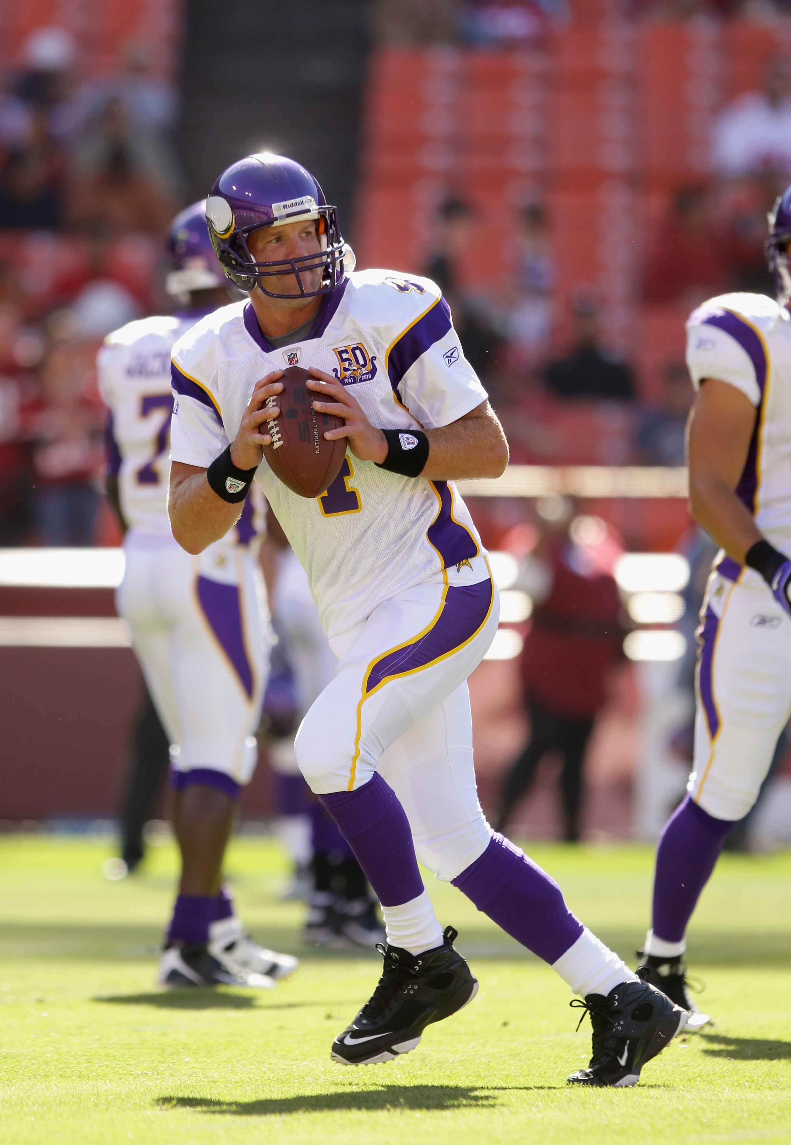 SAN FRANCISCO - AUGUST 22:  Brett Favre #4 of the Minnesota Vikings warms up before their preseason game against the San Francisco 49ers at Candlestick Park on August 22, 2010 in San Francisco, California.  (Photo by Ezra Shaw/Getty Images)