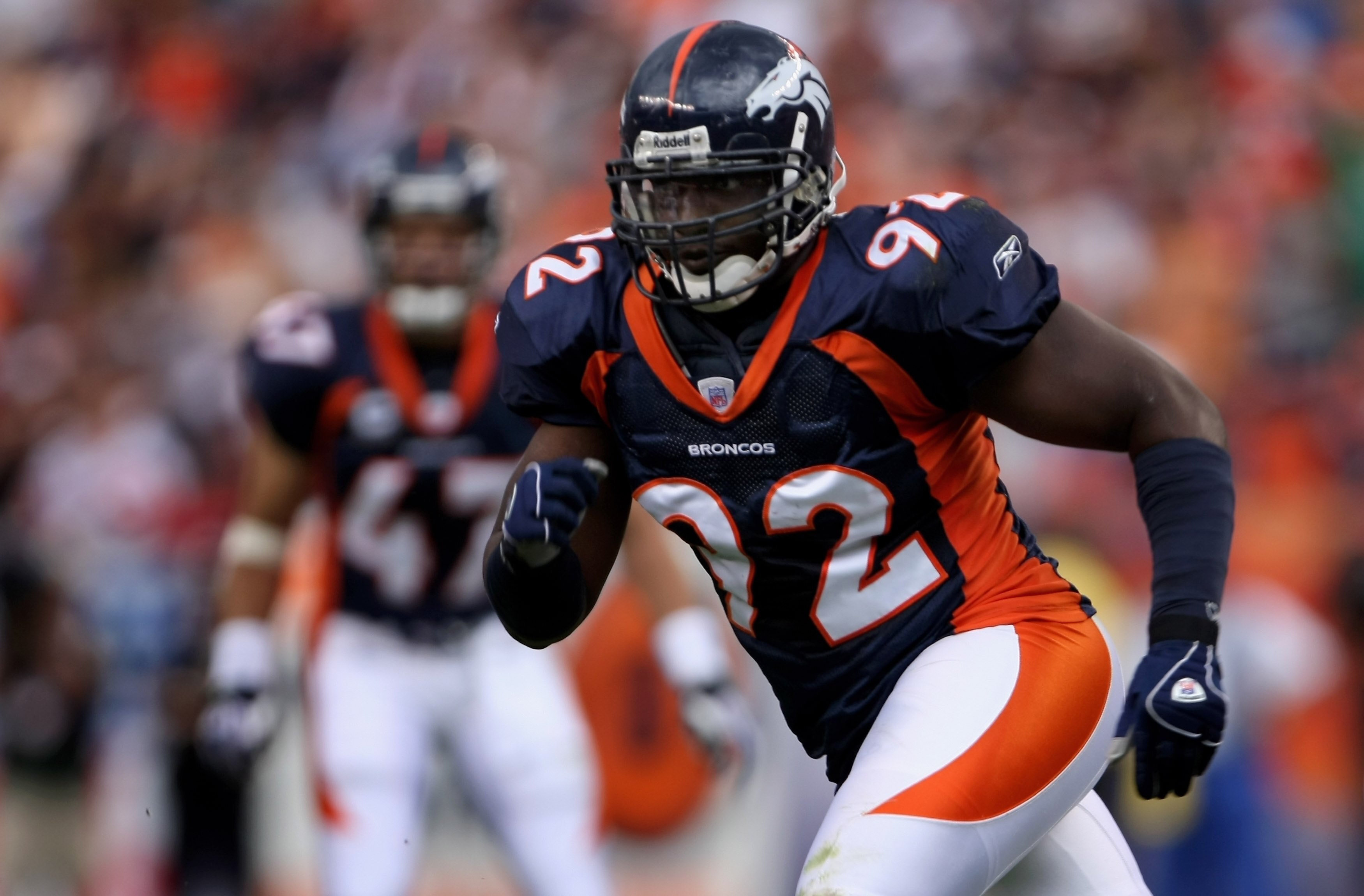 DENVER - SEPTEMBER 16:  Defensive end Elvis Dumervil #92 of the Denver Broncos leaves the line of scrimmage as the Denver Broncos defeated the Oakland Raiders 23-20 in overtime during week two NFL action at Invesco Field at Mile High on September 16, 2007