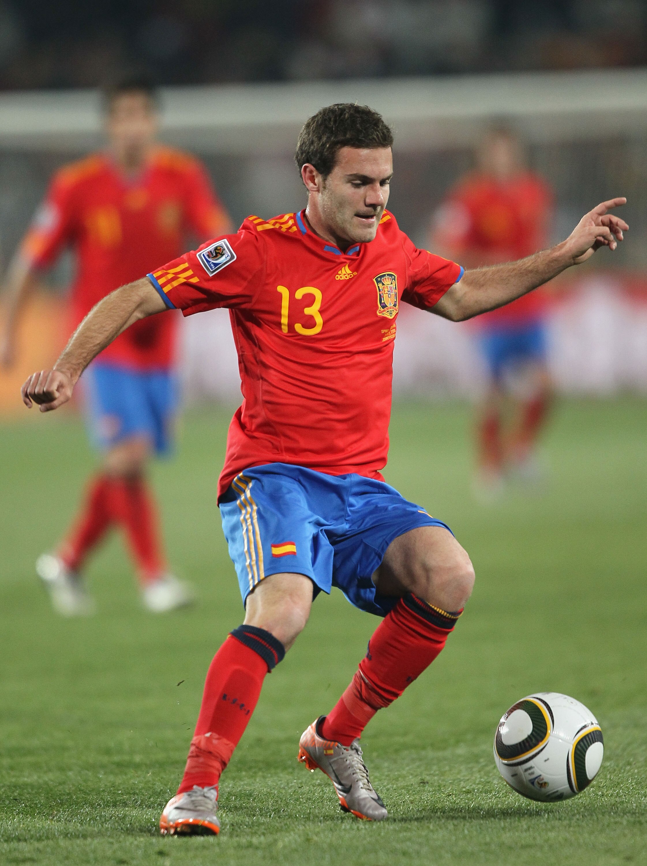 JOHANNESBURG, SOUTH AFRICA - JUNE 21:  Juan Manuel Mata of Spain runs with the ball during the 2010 FIFA World Cup South Africa Group H match between Spain and Honduras at Ellis Park Stadium on June 21, 2010 in Johannesburg, South Africa.  (Photo by Chris