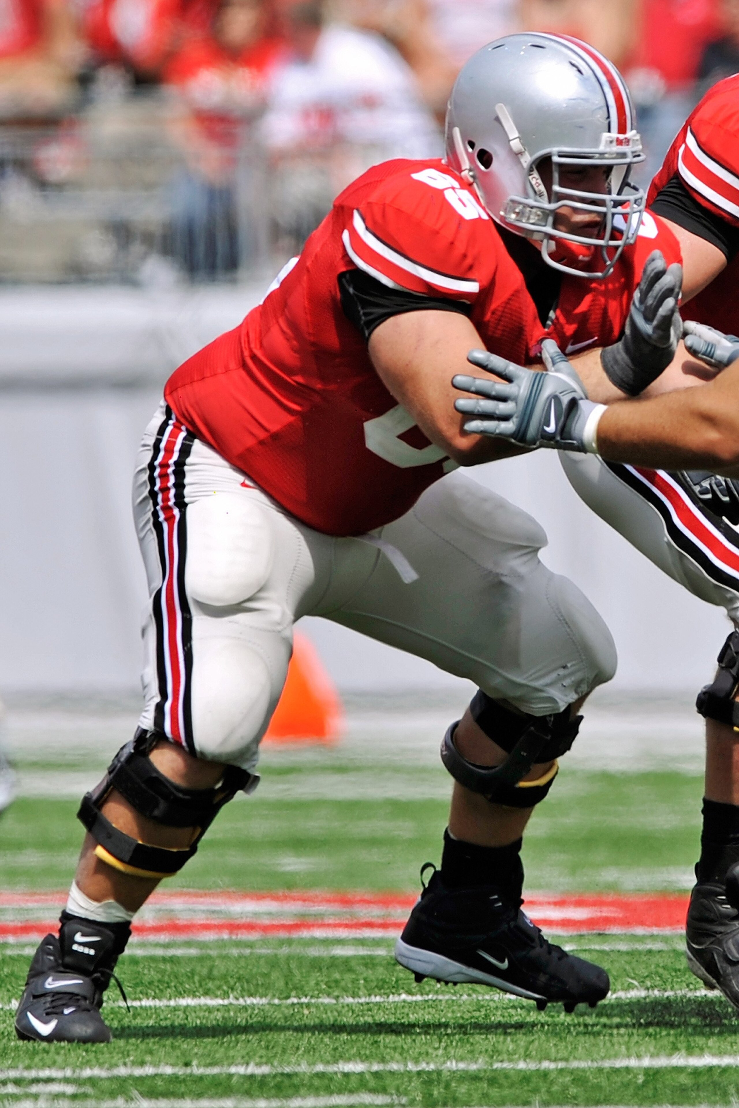 COLUMBUS, OH - SEPTEMBER 05:  Offensive lineman Justin Boren #65 of the Ohio State Buckeyes blocks against the Navy Midshipmen at Ohio Stadium on September 5, 2009 in Columbus, Ohio.  (Photo by Jamie Sabau/Getty Images)