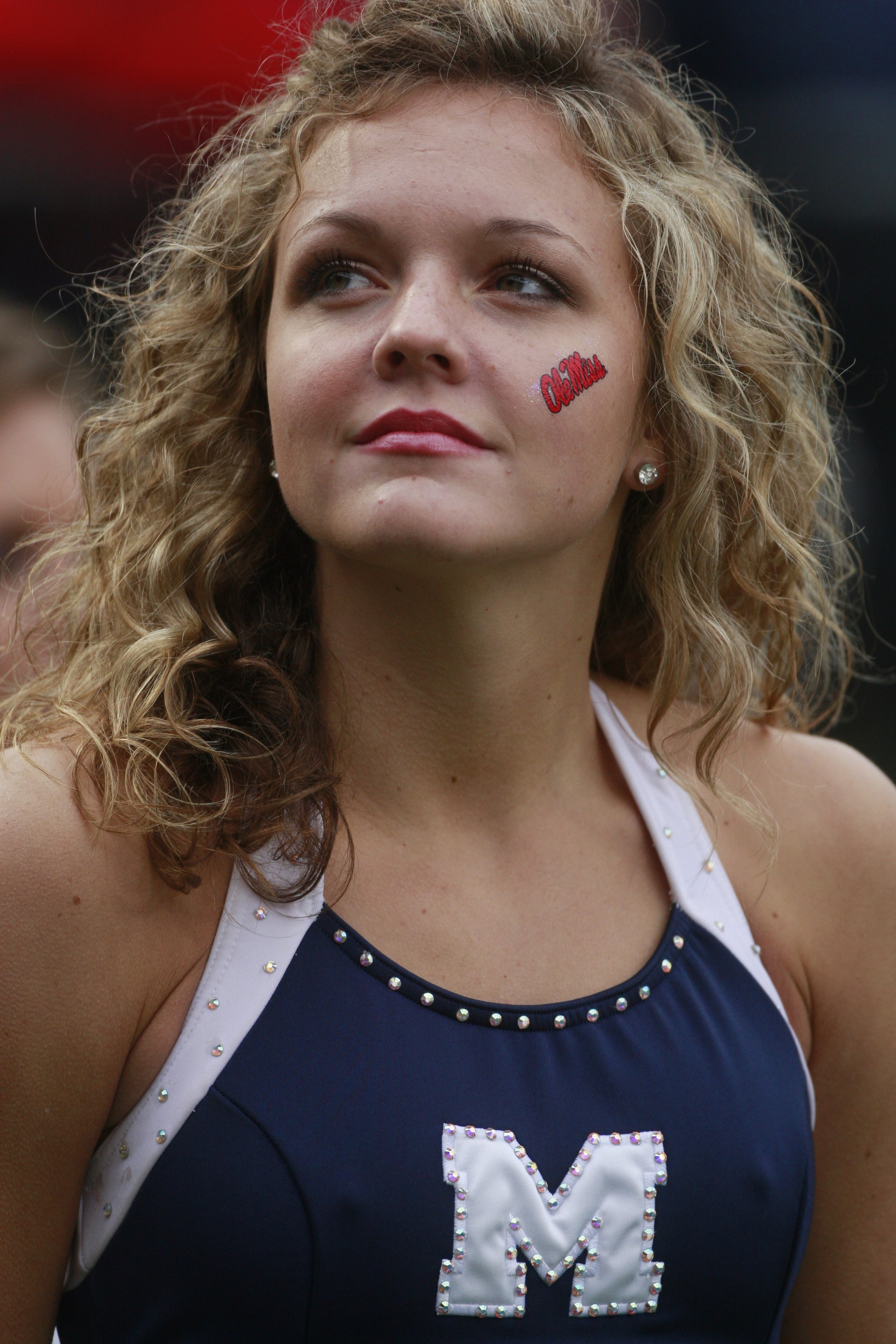 OXFORD, MS - OCTOBER 10:  A Mississippi Rebel cheerleader watches during their game against the Alabama Crimson Tide at Vaught-Hemingway Stadium on October 10, 2009 in Oxford, Mississippi. (Photo by Dave Martin/Getty Images)