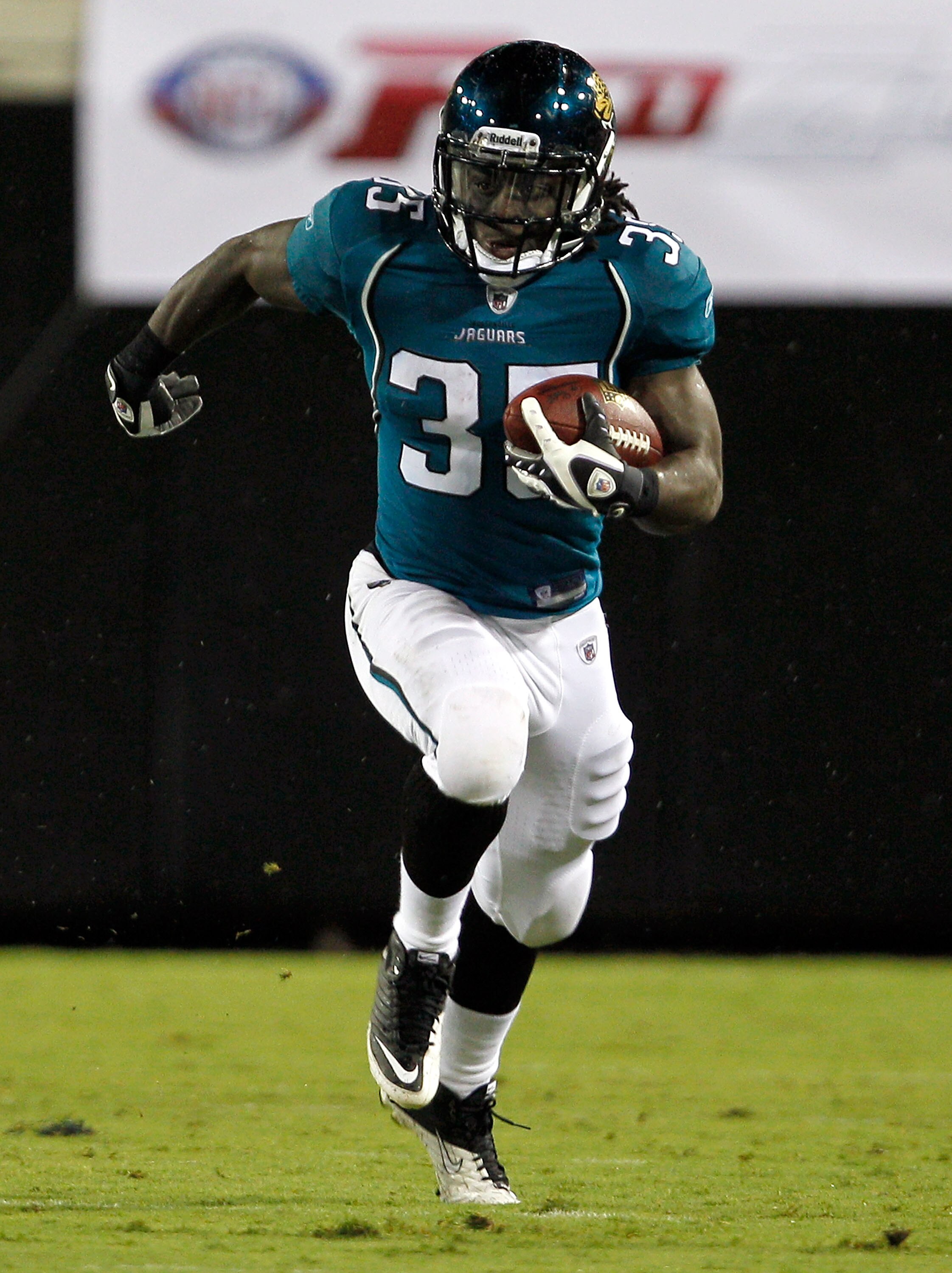 JACKSONVILLE, FL - AUGUST 21:  Deji Karim #35 of the Jacksonville Jaguars returns a kick during the preseason game against the Miami Dolphins at EverBank Field on August 21, 2010 in Jacksonville, Florida.  (Photo by Sam Greenwood/Getty Images)