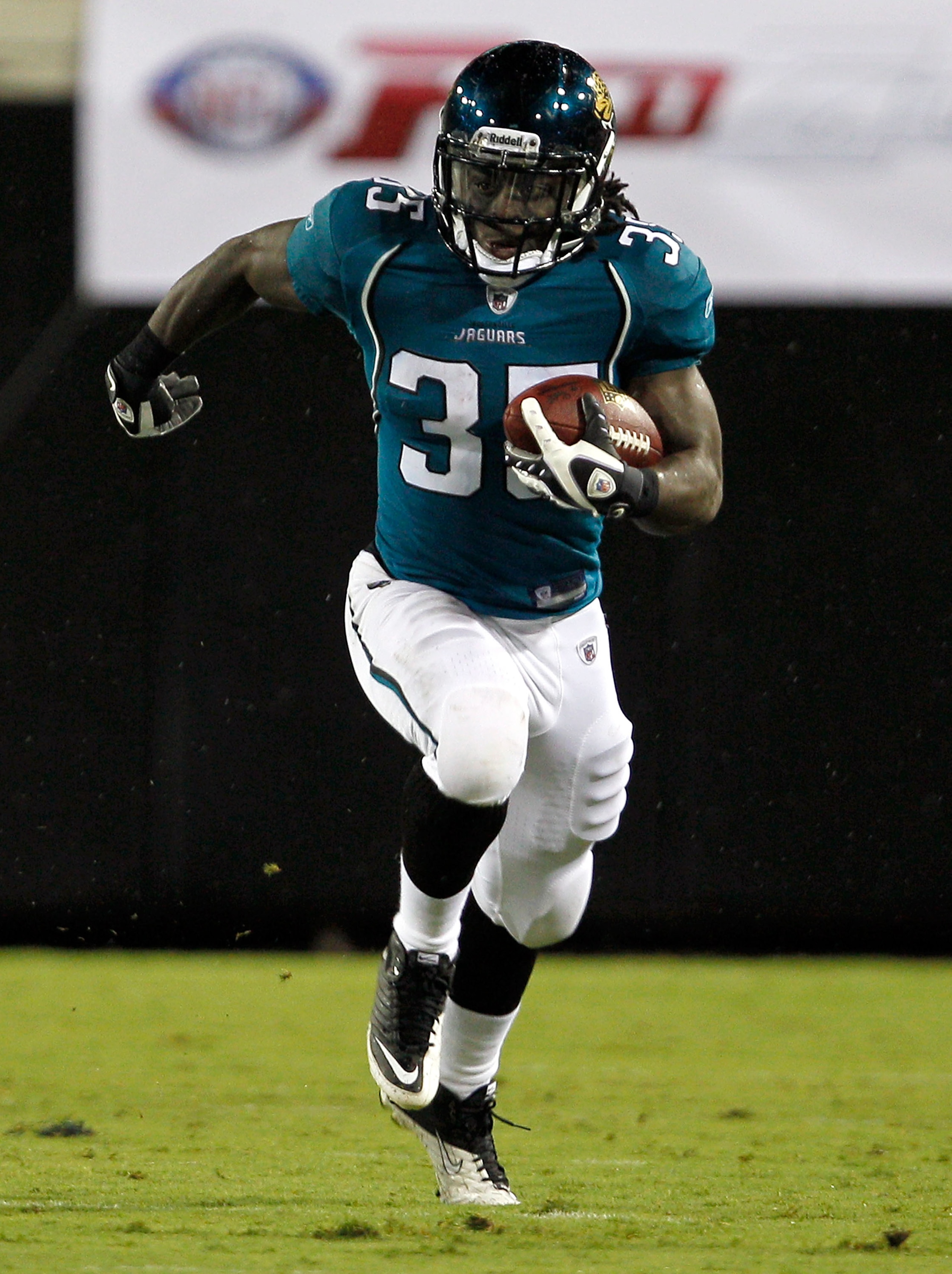 JACKSONVILLE, FL - AUGUST 21:  Deji Karim #35 of the Jacksonville Jaguars returns a kick during the preseason game against the Miami Dolphins at EverBank Field on August 21, 2010 in Jacksonville, Florida.  (Photo by Sam Greenwood/Getty Images)