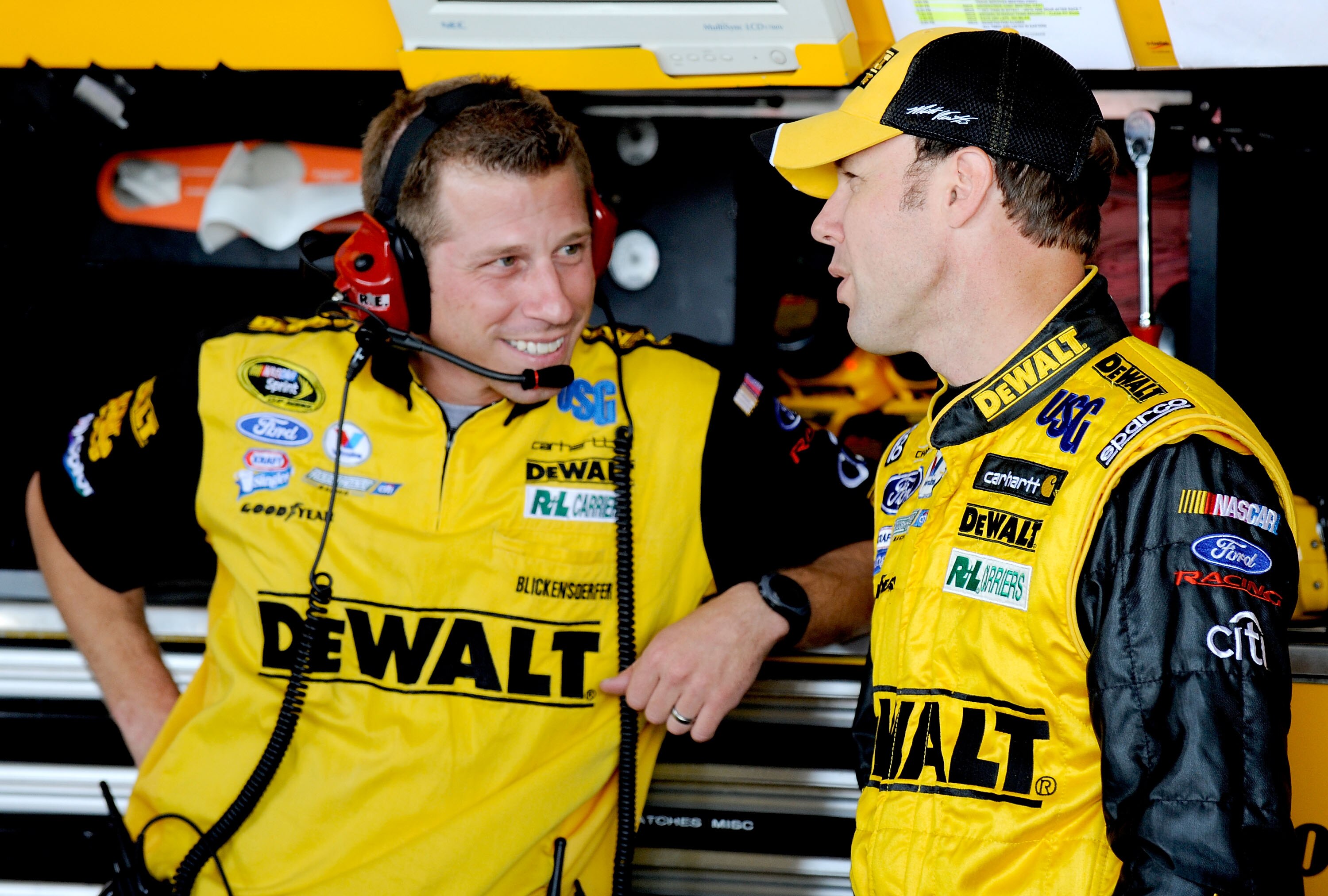 RICHMOND, VA - SEPTEMBER 11:  Matt Kenseth, driver of the #17 Dewalt Ford, stands with his crew chief Drew Blickensderfer, in the garage area during practice for the NASCAR Sprint Cup Series Chevy Rock & Roll 400 at Richmond International Raceway on Septe