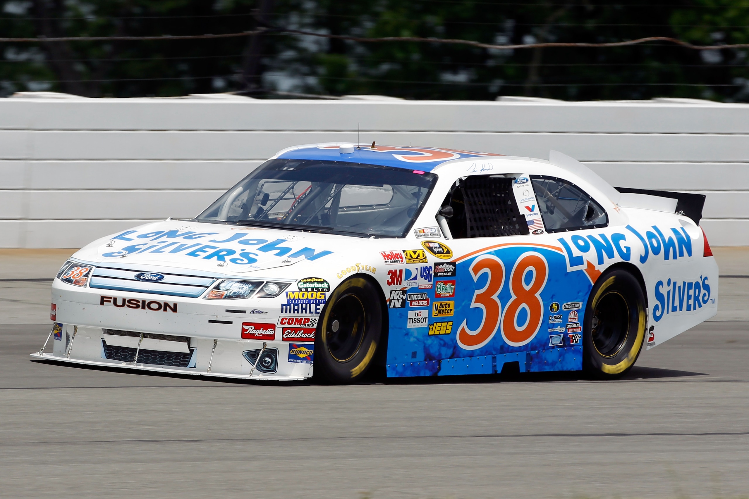 LONG POND, PA - JUNE 04:  Travis Kvapil drives the #38 Long John Silver's/Baja Fish Taco Ford during practice for the NASCAR Sprint Cup Series Gillette Fusion ProGlide 500 at Pocono Raceway on June 4, 2010 in Long Pond, Pennsylvania.  (Photo by Chris Trot