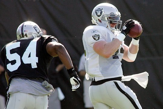 Sam Williams gets after the man with the ball.