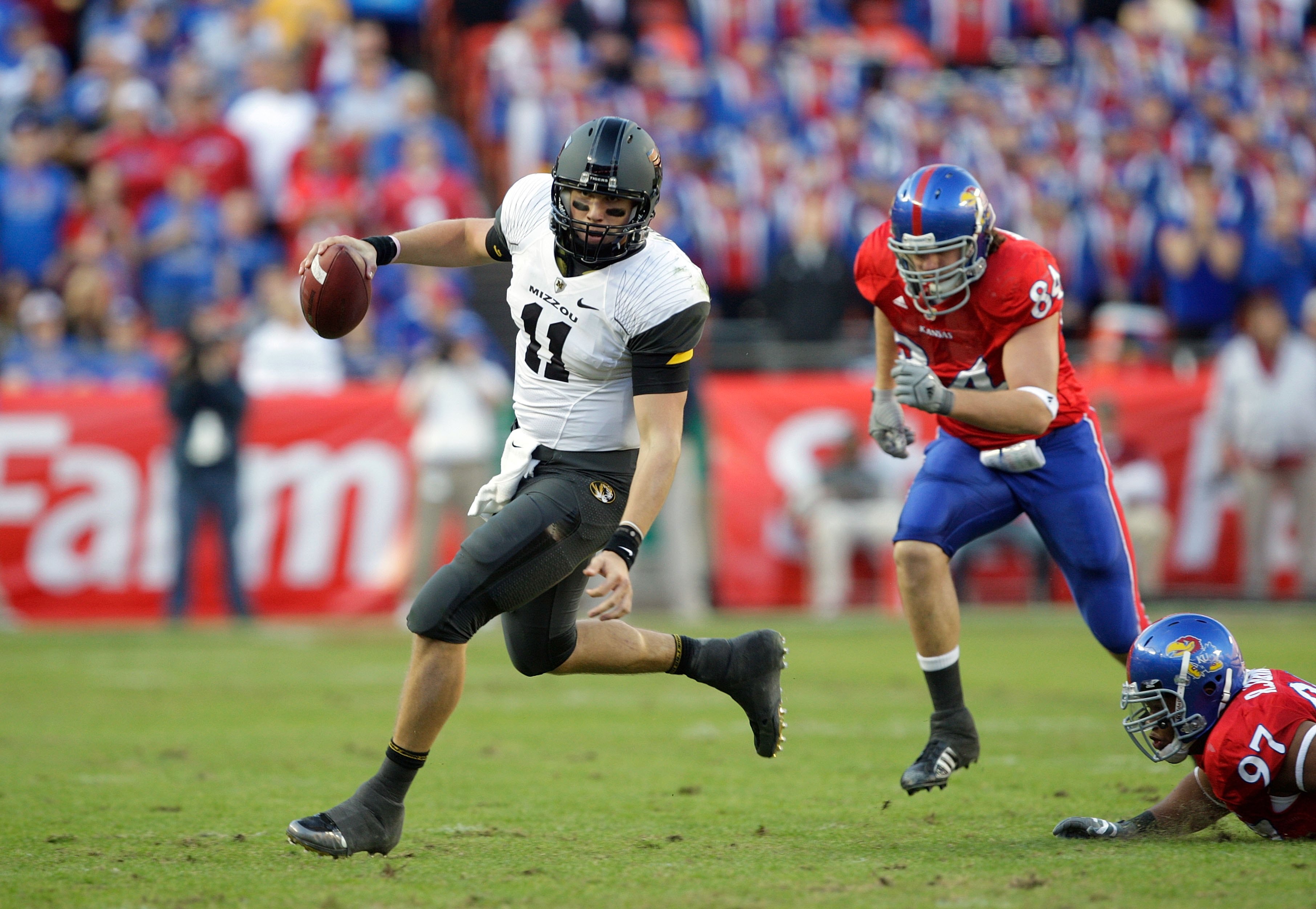 KANSAS CITY, MO - NOVEMBER 28:  Quarterback Blaine Gabbert #11 of the Missouri Tigers runs to his right for yardage during their game against the Kansas Jayhawks during the game at Arrowhead Stadium on November 28, 2009 in Kansas City, Missouri. (Photo by