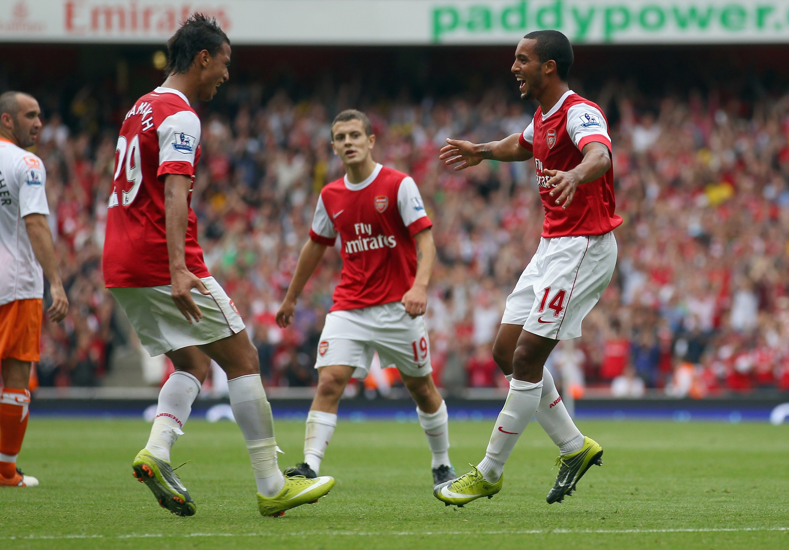LONDON, ENGLAND - AUGUST 21:  Theo Walcott of Arsenal celebrates his second goal during the Barclays Premier League match between Arsenal and Blackpool at The Emirates Stadium on August 21, 2010 in London, England.  (Photo by Clive Rose/Getty Images)