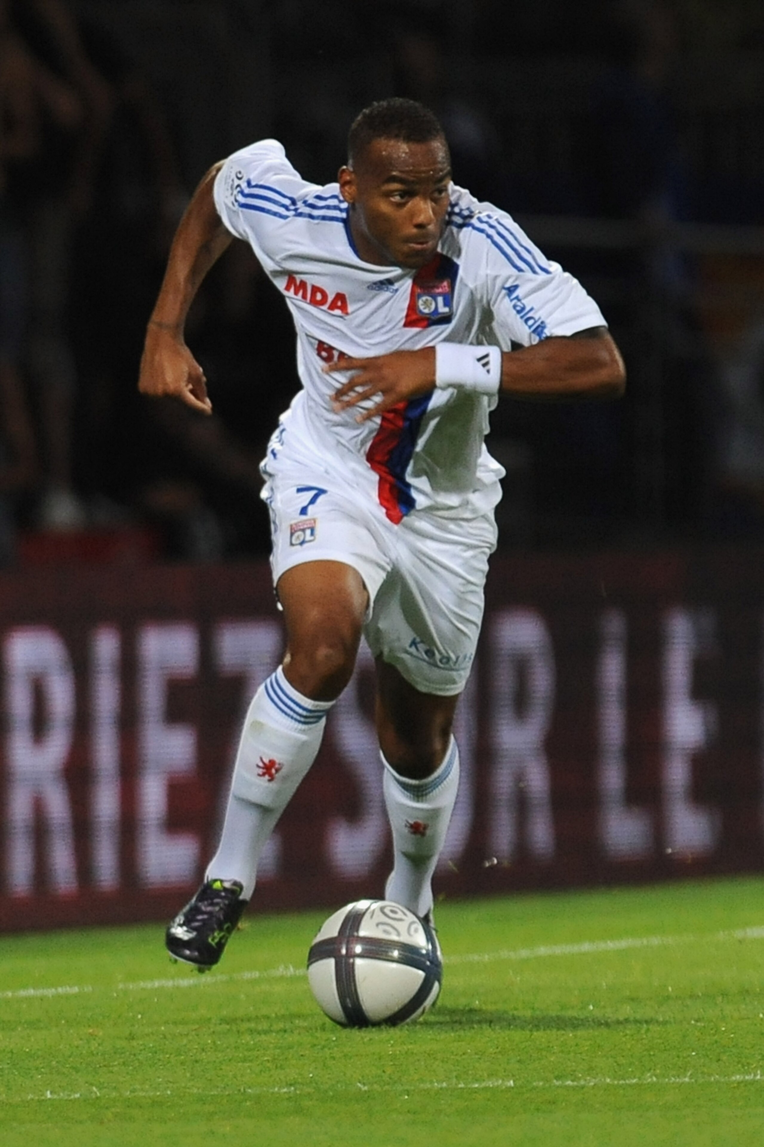 LYON, FRANCE - AUGUST 07:  Jimmy Briand of Olympique Lyonnais in action during the Ligue 1 match between Olympique Lyonnais and AS Monaco FC at Gerland Stadium on August 7, 2010 in Lyon, France.  (Photo by Valerio Pennicino/Getty Images)
