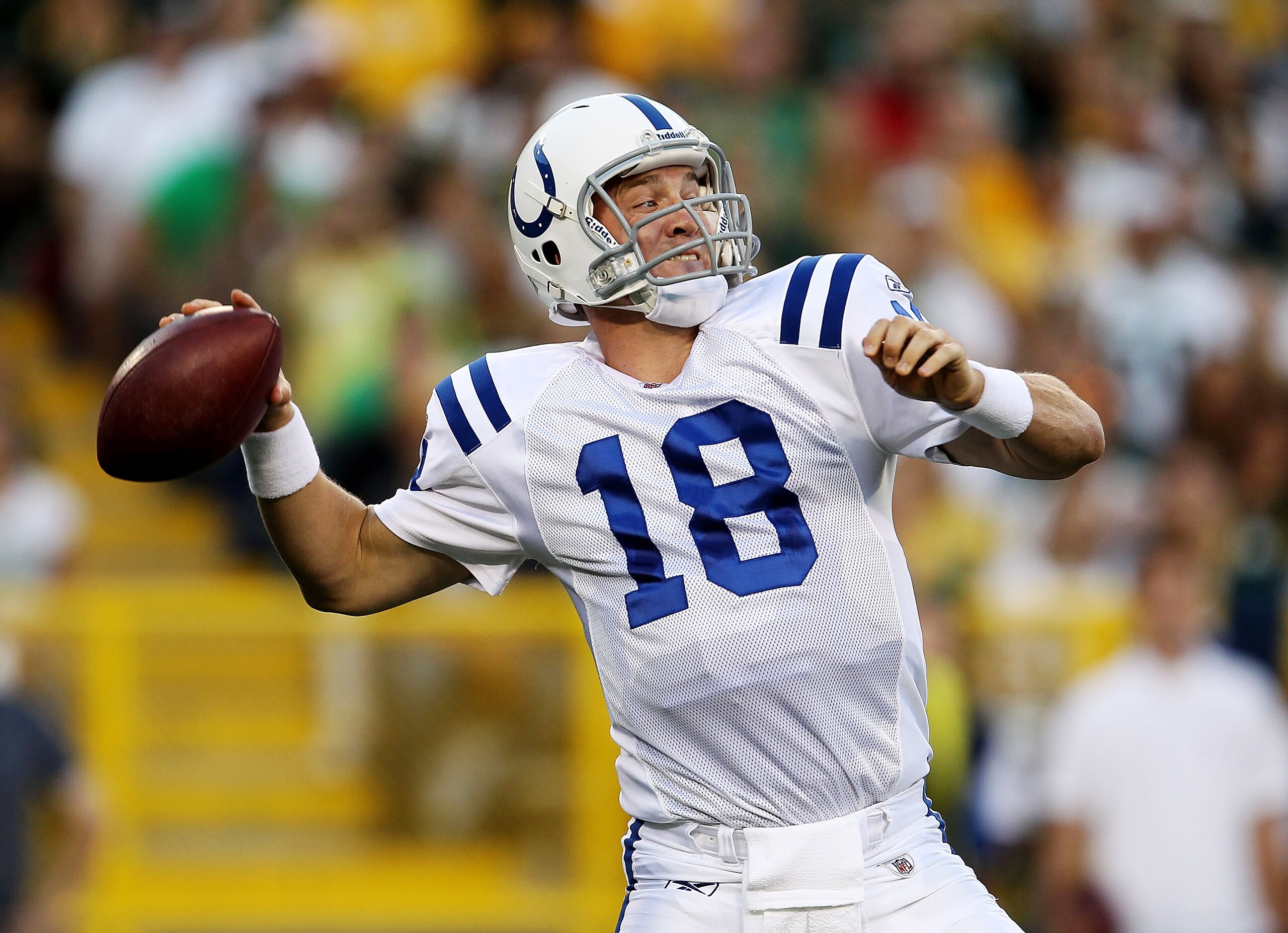 GREEN BAY, WI - AUGUST 26: Peyton Manning #18 of the Indianapolis Colts throws a pass against the Green Bay Packers during a preseason game at Lambeau Field on August 26, 2010 in Green Bay, Wisconsin. (Photo by Jonathan Daniel/Getty Images)