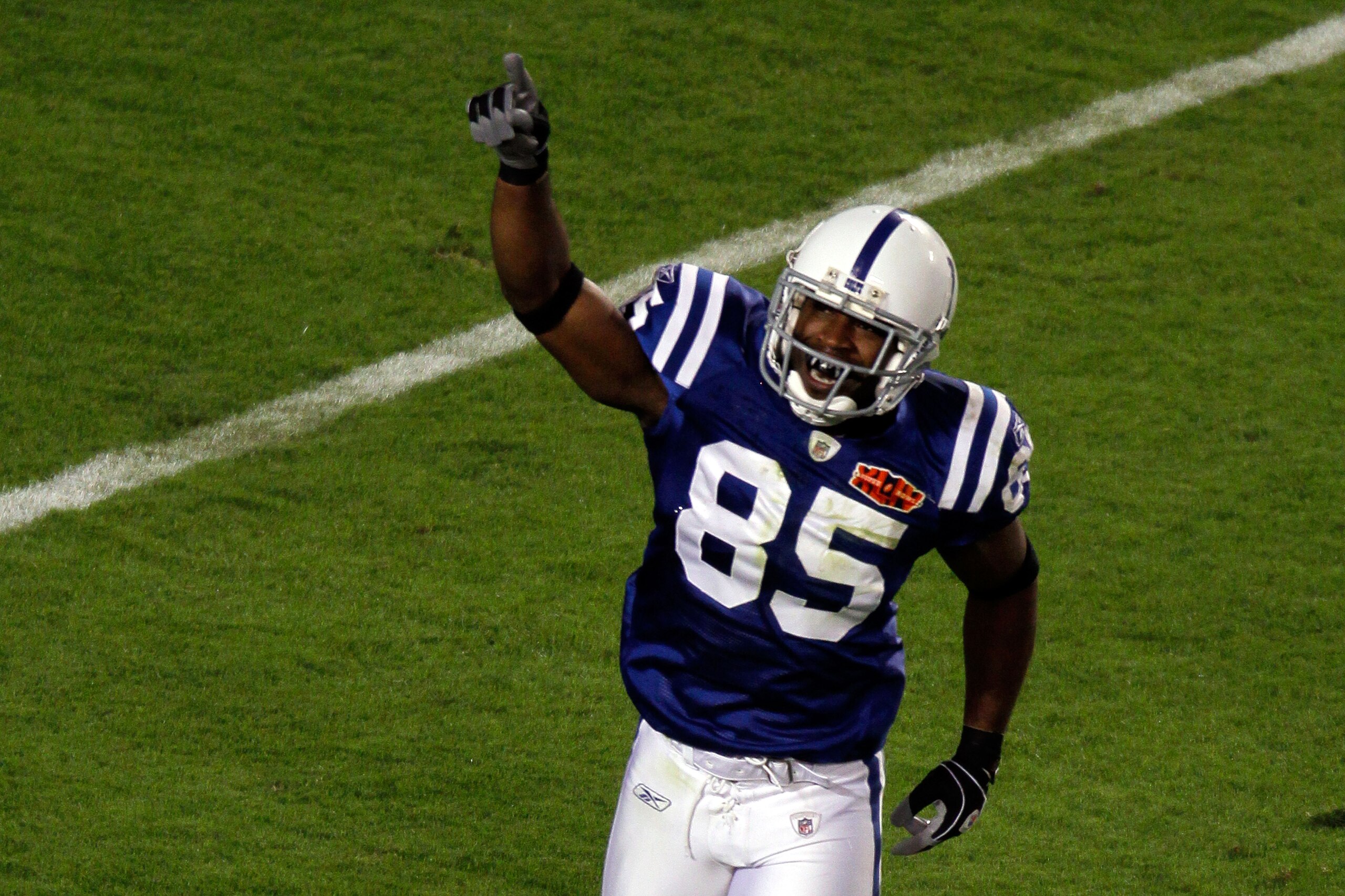 MIAMI GARDENS, FL - FEBRUARY 07:  Pierre Garcon #85 of the Indianapolis Colts runs off the field after making a catch for a touchdown in the first quarter against the New Orleans Saints during the first quarter Super Bowl XLIV on February 7, 2010 at Sun L