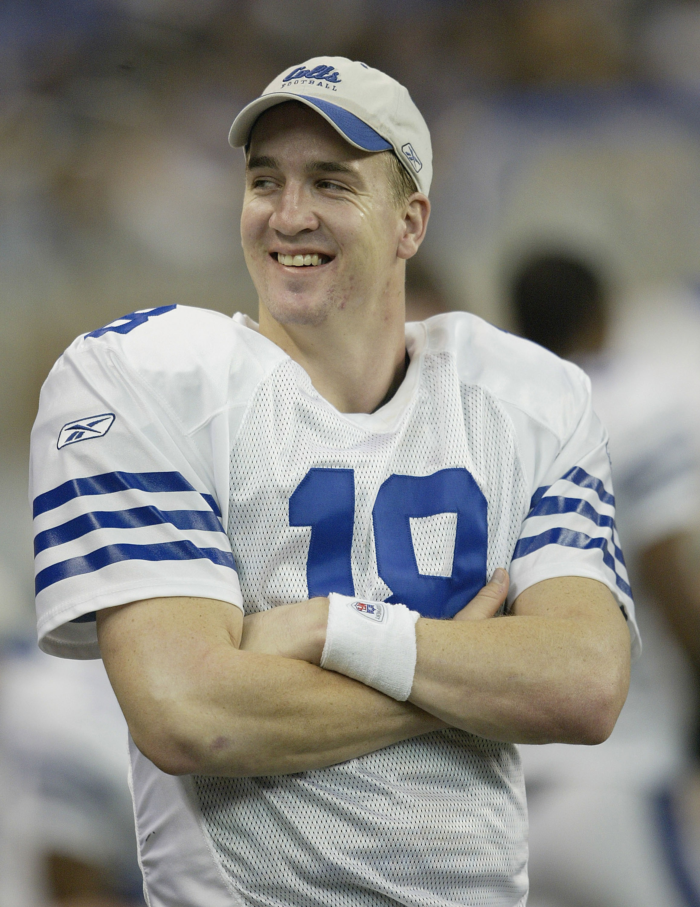 DETROIT, MI - NOVEMBER 25:  Peyton Manning #18 of the Indianapolis Colts smiles on the sidelines in the third quarter against the Detroit Lions at Ford Field on November 25, 2004 in Detroit, Michigan. (Photo by Tom Pidgeon/Getty Images)