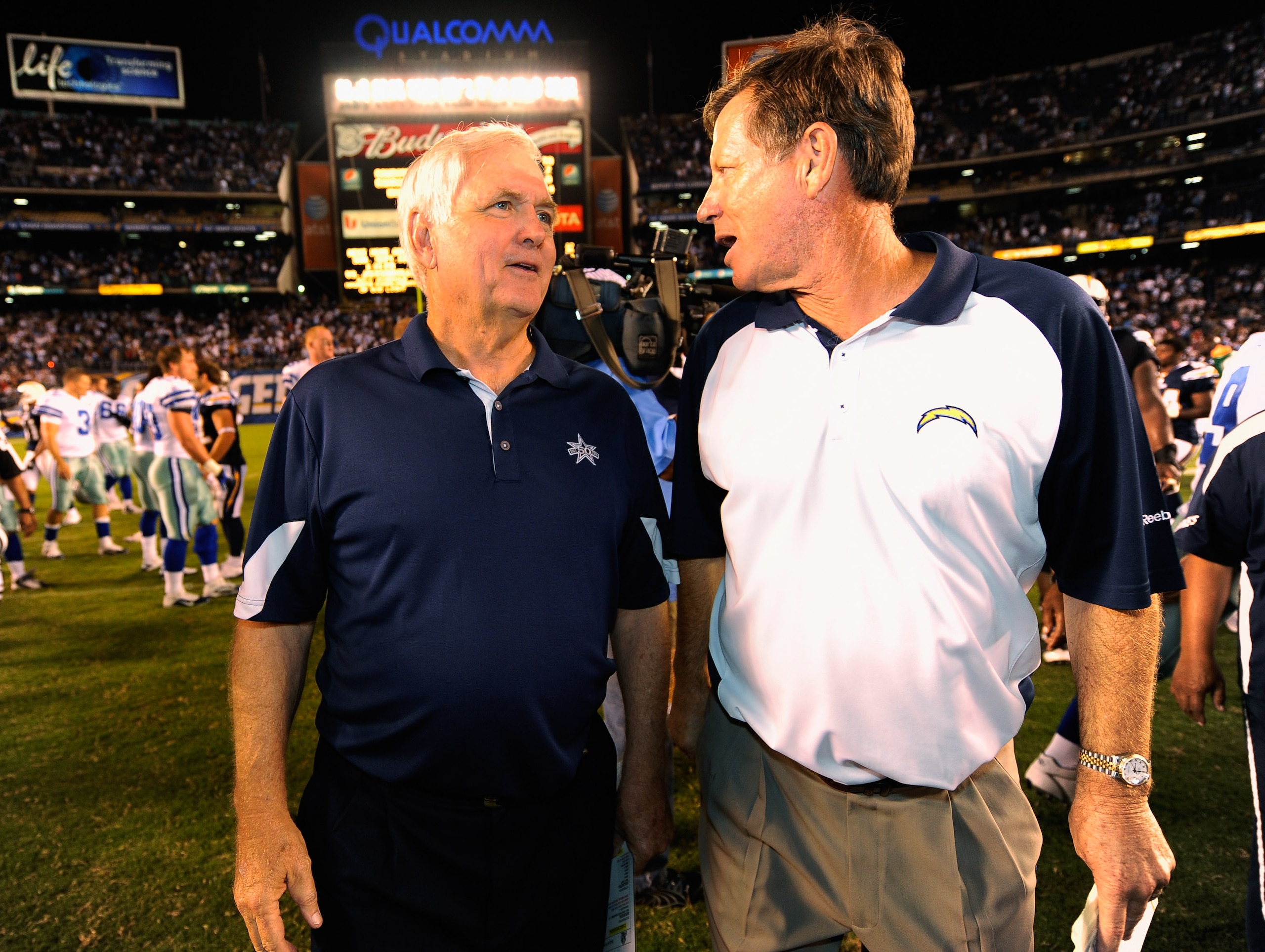 SAN DIEGO - AUGUST 21:  Head coach Wade Phillips (L) of the Dallas Cowboys and head coach Norv Turner of the San Diego Chargers meet each other after their preseason NFL football game at Qualcomm Stadium on August 21, 2010 in San Diego, California.  (Phot