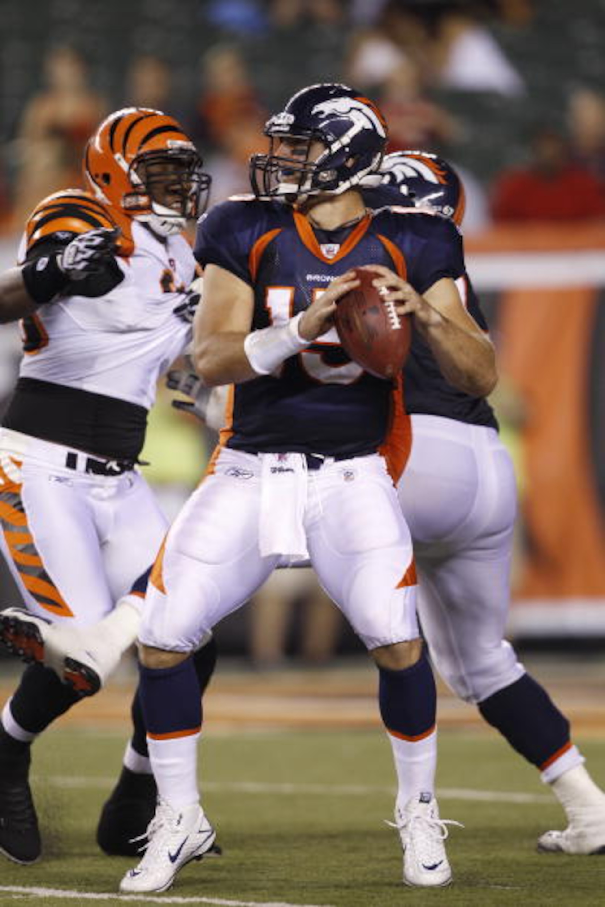 CINCINNATI, OH - AUGUST 15: Tim Tebow #15 of the Denver Broncos looks to pass during the preseason game against the Cincinnati Bengals at Paul Brown Stadium on August 15, 2010 in Cincinnati, Ohio. The Bengals won 33-24. (Photo by Joe Robbins/Getty Images) CINCINNATI, OH - AUGUST 15: Tim Tebow #15 of the Denver Broncos looks to pass during the preseason game against the Cincinnati Bengals at Paul Brown Stadium on August 15, 2010 in Cincinnati, Ohio. The Bengals won 33-24. (Photo by Joe Robbins/Getty Images)