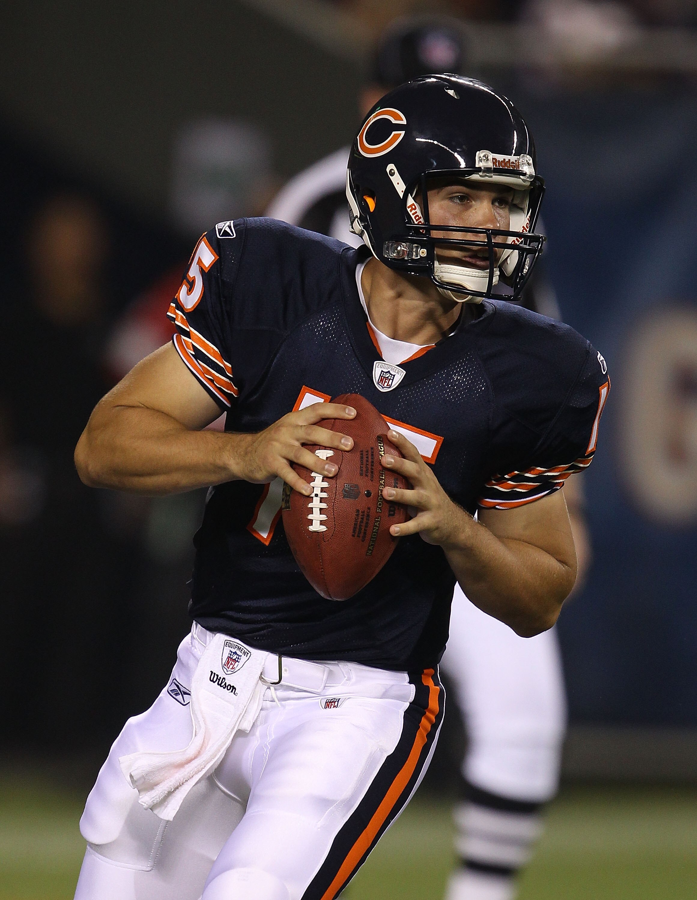 CHICAGO - AUGUST 21: Dan LeFevour #15 of the Chicago Bears looks for a receiver against the Oakland Raiders during a preseason game at Soldier Field on August 21, 2010 in Chicago, Illinois. The Raiders defeated the Bears 32-17. (Photo by Jonathan Daniel/G