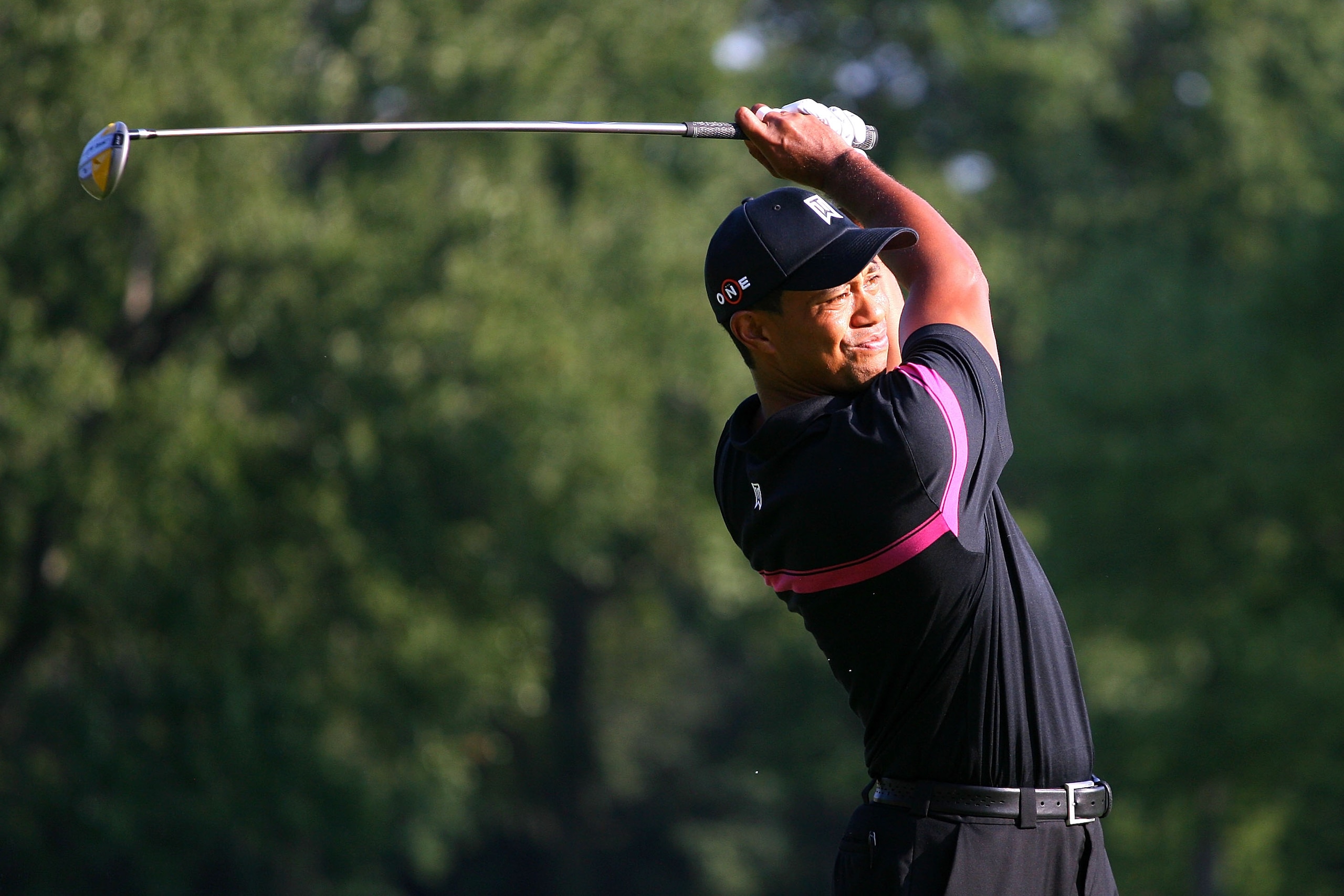 PARAMUS, NJ - AUGUST 26:  Tiger Woods watches his tee shot on the seventh hole during the first round of The Barclays at the Ridgewood Country Club on August 26, 2010 in Paramus, New Jersey.  (Photo by Hunter Martin/Getty Images)