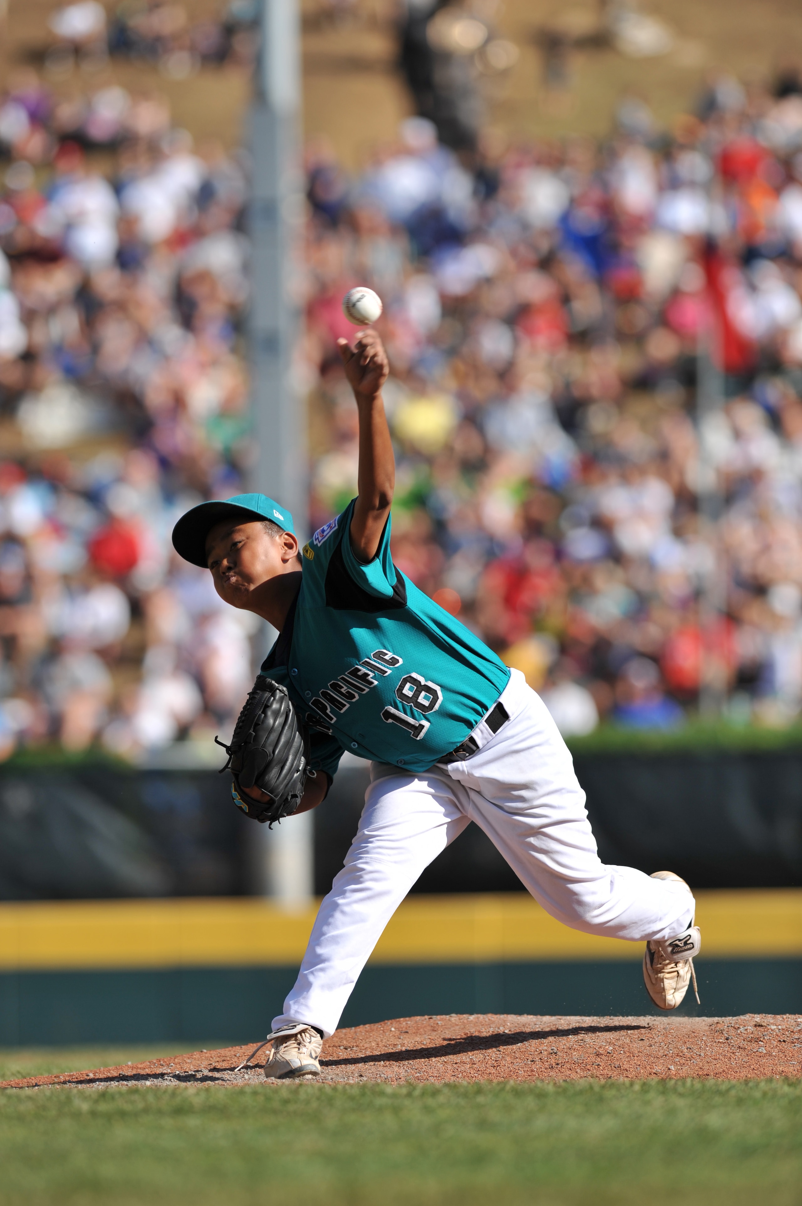 WILLIAMSPORT, PA - AUGUST 30: Starting pitcher Chin Ou of Asia Pacific (Taoyuan, Taiwan) pitches against California (Chula Vista) in the little league world series final at Lamade Stadium on August 30, 2009 in Williamsport, Pennsylvania. (Photo by Larry F