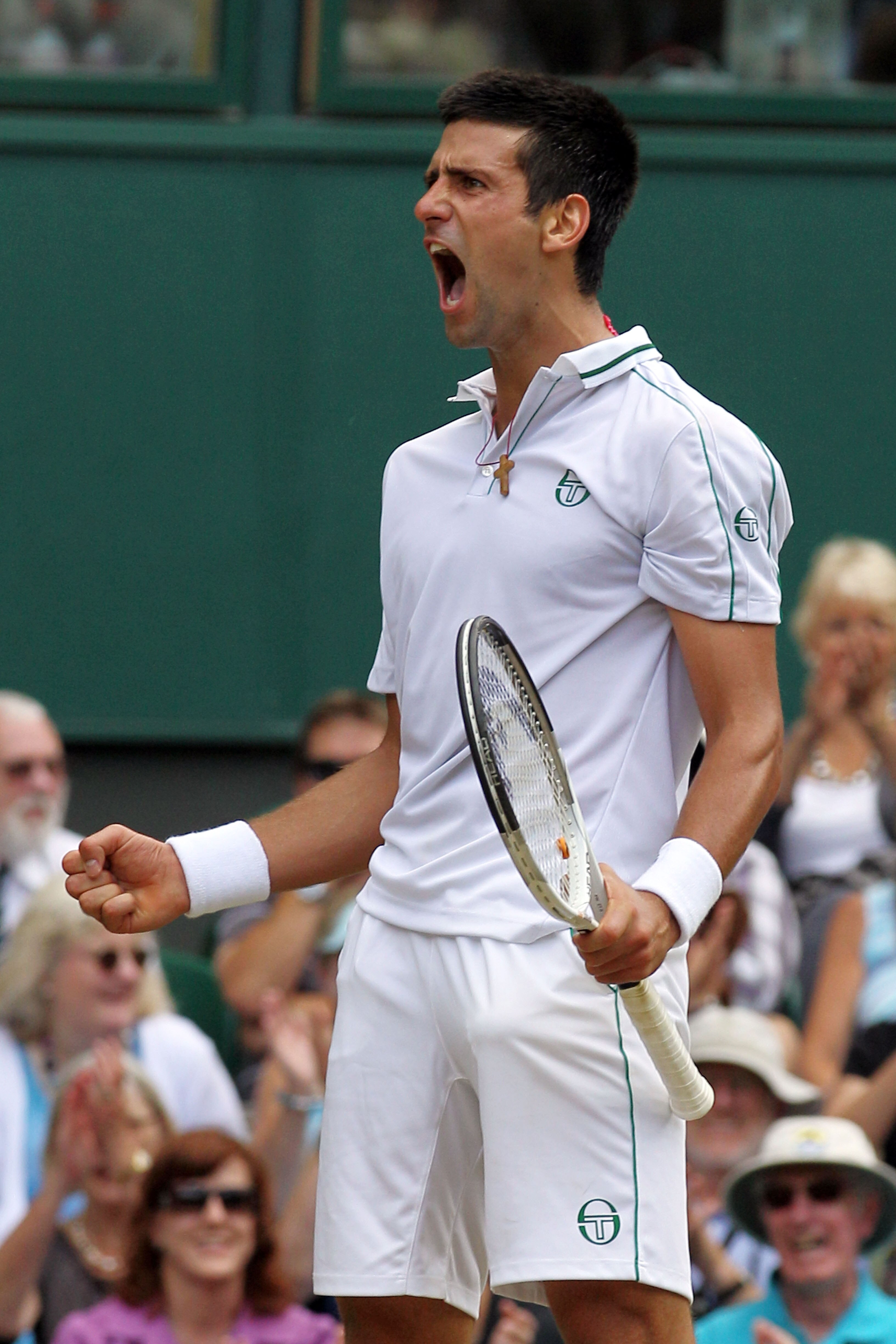 LONDON, ENGLAND - JULY 02:  Novak Djokovic of Serbia celebrates a point during the Menï¿½s Semi Final match against Tomas Berdych of Czech Republic on Day Eleven of the Wimbledon Lawn Tennis Championships at the All England Lawn Tennis and Croquet Club on J