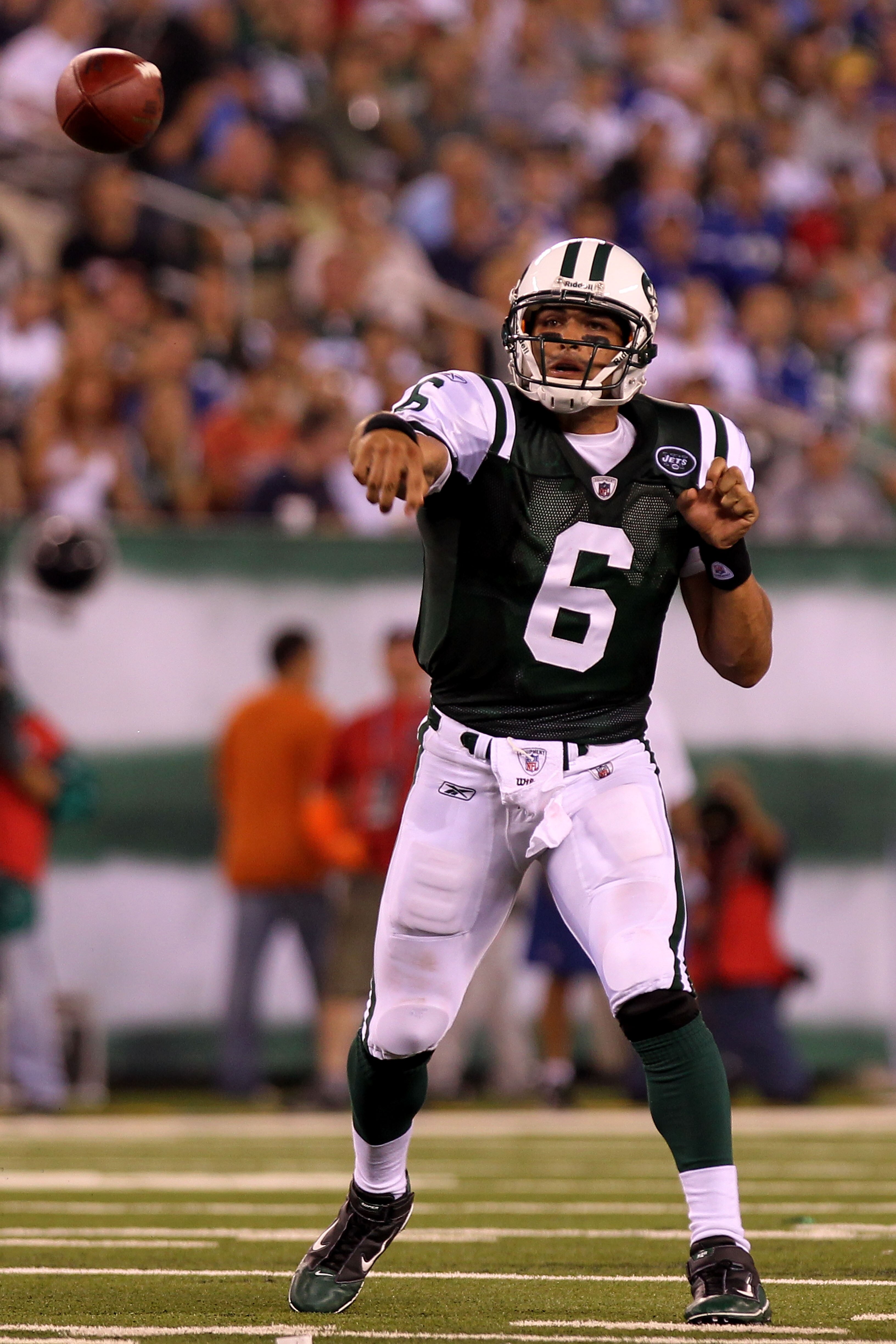 EAST RUTHERFORD, NJ - AUGUST 16:  Quarterback Mark Sanchez #6 of the New York Jets passes against the New York Giants during their game at New Meadowlands Stadium on August 16, 2010 in East Rutherford, New Jersey.  (Photo by Nick Laham/Getty Images)
