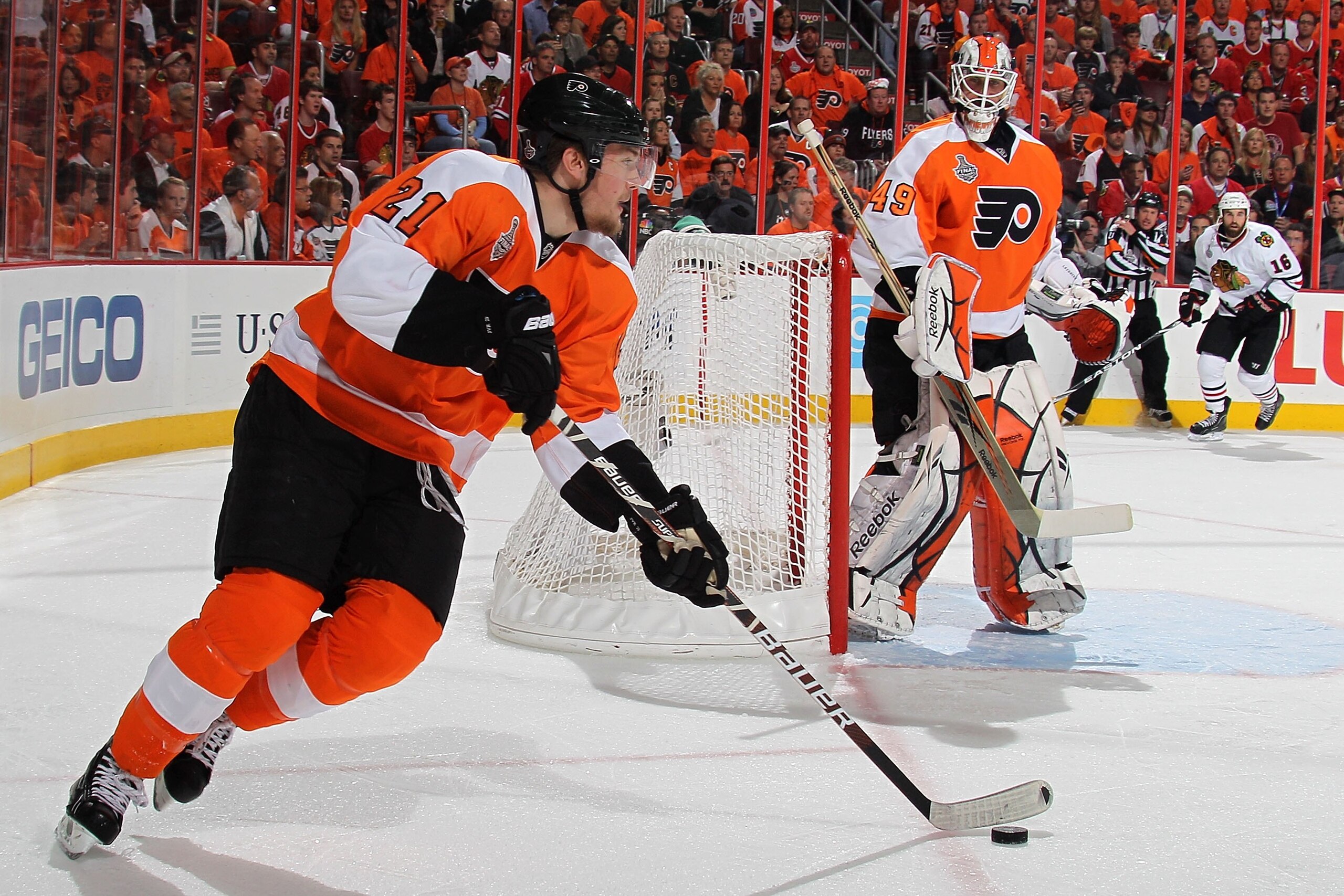 PHILADELPHIA - JUNE 09: James van Riemsdyk #21 of the Philadelphia Flyers skates with the puck around the net of teammate Michael Leighton #49 in Game Six of the 2010 NHL Stanley Cup Final against the Chicago Blackhawks at the Wachovia Center on June 9, PHILADELPHIA - JUNE 09: James van Riemsdyk #21 of the Philadelphia Flyers skates with the puck around the net of teammate Michael Leighton #49 in Game Six of the 2010 NHL Stanley Cup Final against the Chicago Blackhawks at the Wachovia Center on June 9,