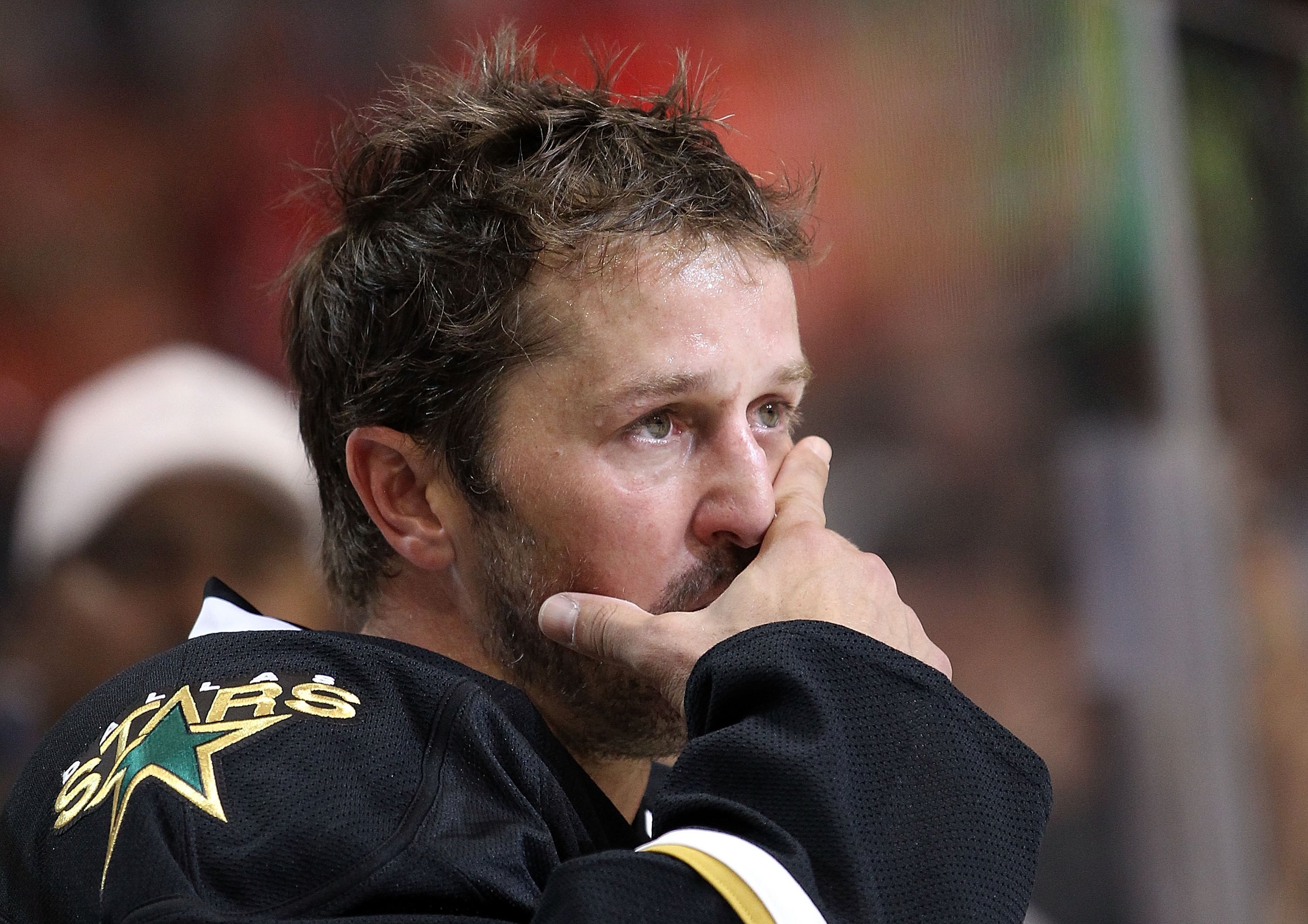 DALLAS - APRIL 08:  Center Mike Modano #9 of the Dallas Stars reacts after his last home game of the season against the Anaheim Ducks at American Airlines Center on April 8, 2010 in Dallas, Texas.  (Photo by Ronald Martinez/Getty Images)