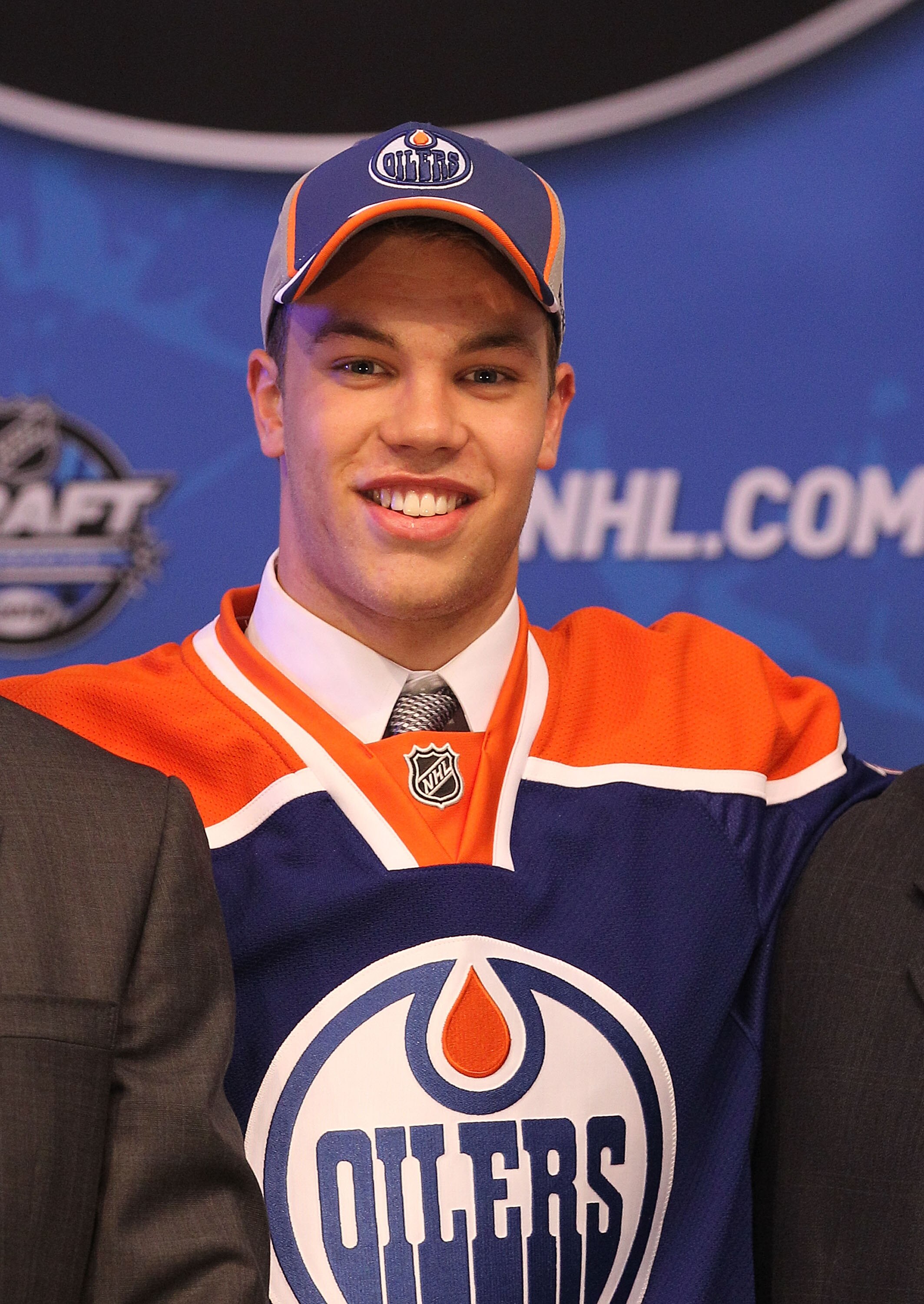 LOS ANGELES, CA - JUNE 25:  Taylor Hall, drafted #1 overall by the Edmonton Oilers, poses on stage during the 2010 NHL Entry Draft at Staples Center on June 25, 2010 in Los Angeles, California.  (Photo by Bruce Bennett/Getty Images)