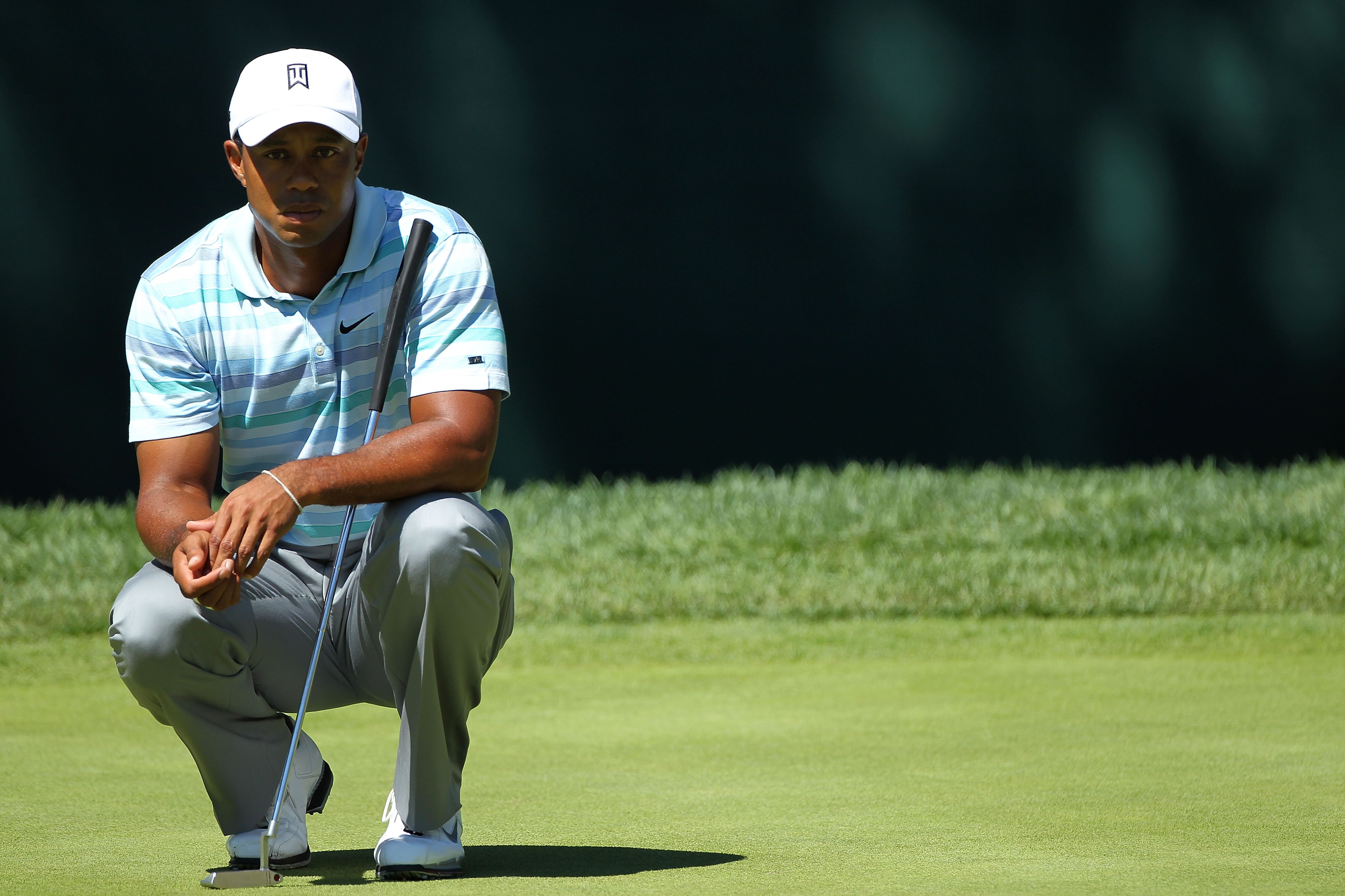 PARAMUS, NJ - AUGUST 27:  Tiger Woods libes up a putt on the green of the 17th hole during the second round of The Barclays at the Ridgewood Country Club on August 27, 2010 in Paramus, New Jersey.  (Photo by Hunter Martin/Getty Images)