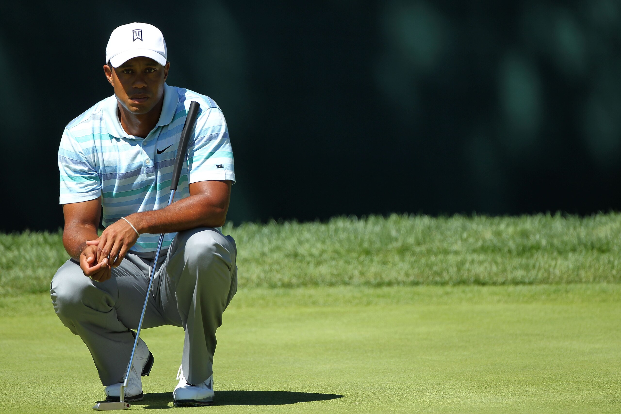 PARAMUS, NJ - AUGUST 27:  Tiger Woods libes up a putt on the green of the 17th hole during the second round of The Barclays at the Ridgewood Country Club on August 27, 2010 in Paramus, New Jersey.  (Photo by Hunter Martin/Getty Images)