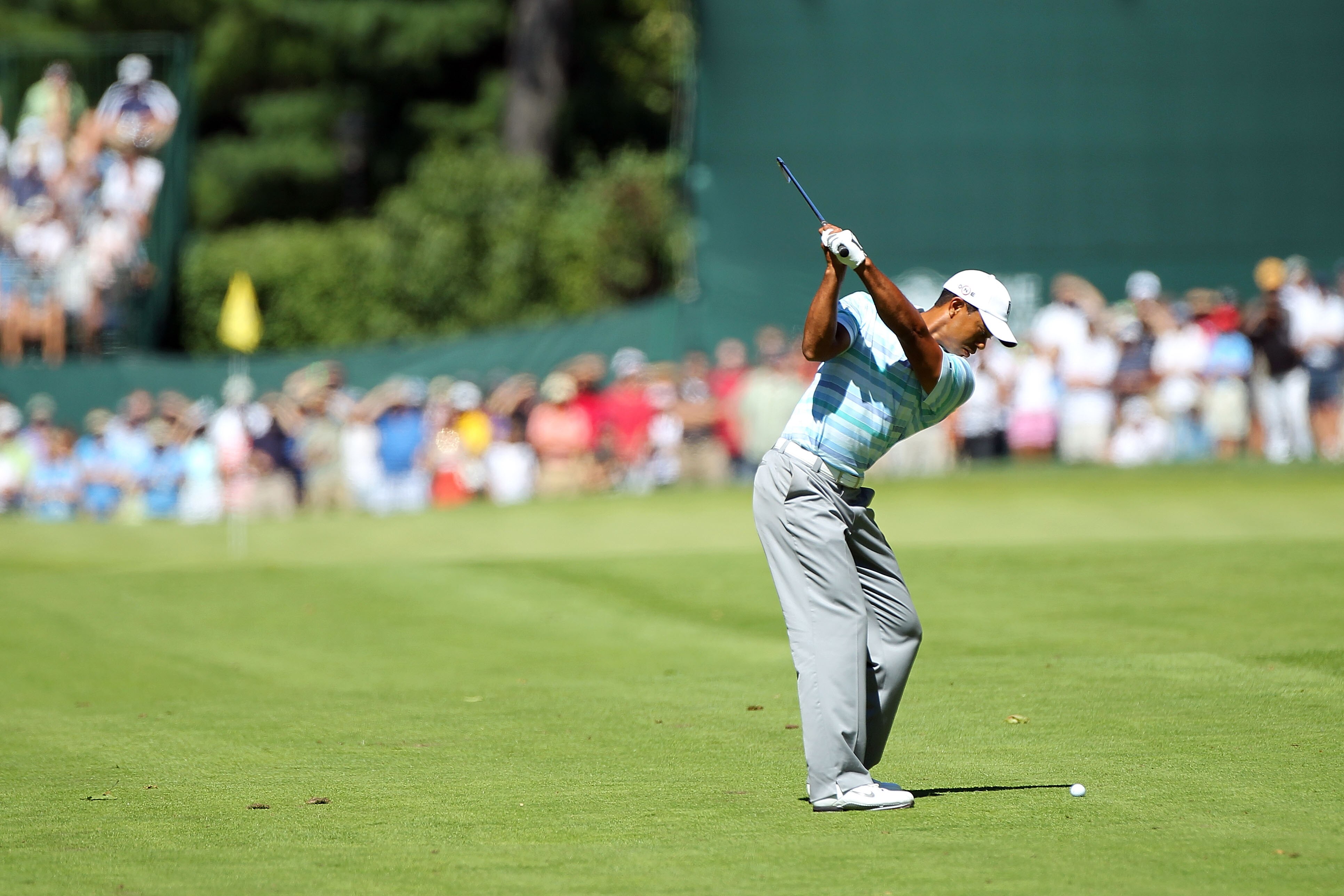 PARAMUS, NJ - AUGUST 27:  Tiger Woods hits his second shot on the 18th hole during the second round of The Barclays at the Ridgewood Country Club on August 27, 2010 in Paramus, New Jersey.  (Photo by Hunter Martin/Getty Images)